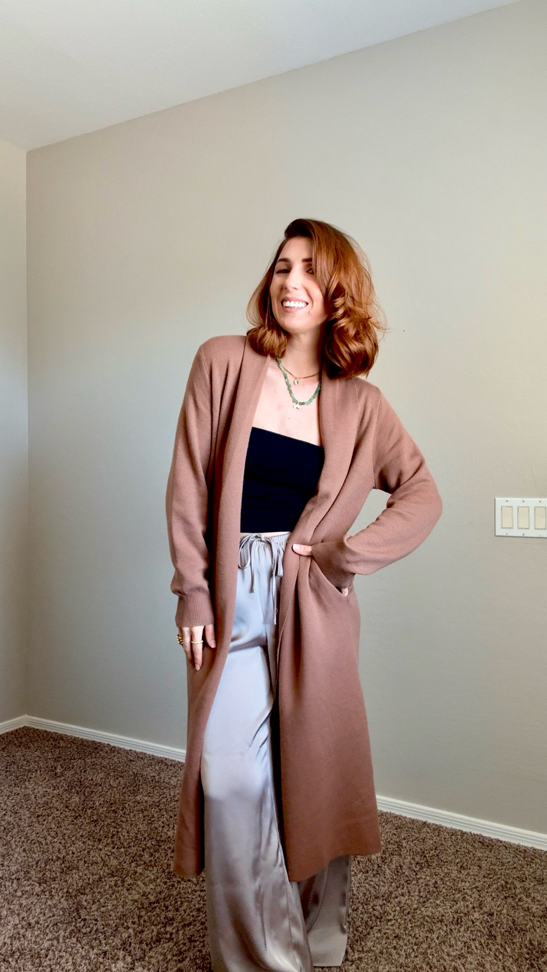 Long wool sweater duster size M. Black tube top size S, comes in 3 pack. Gold & green jewelry is hypoallergenic. Satin pants are from @tjmaxx 

#LTKPetite #LTKmomlife #LTKootd