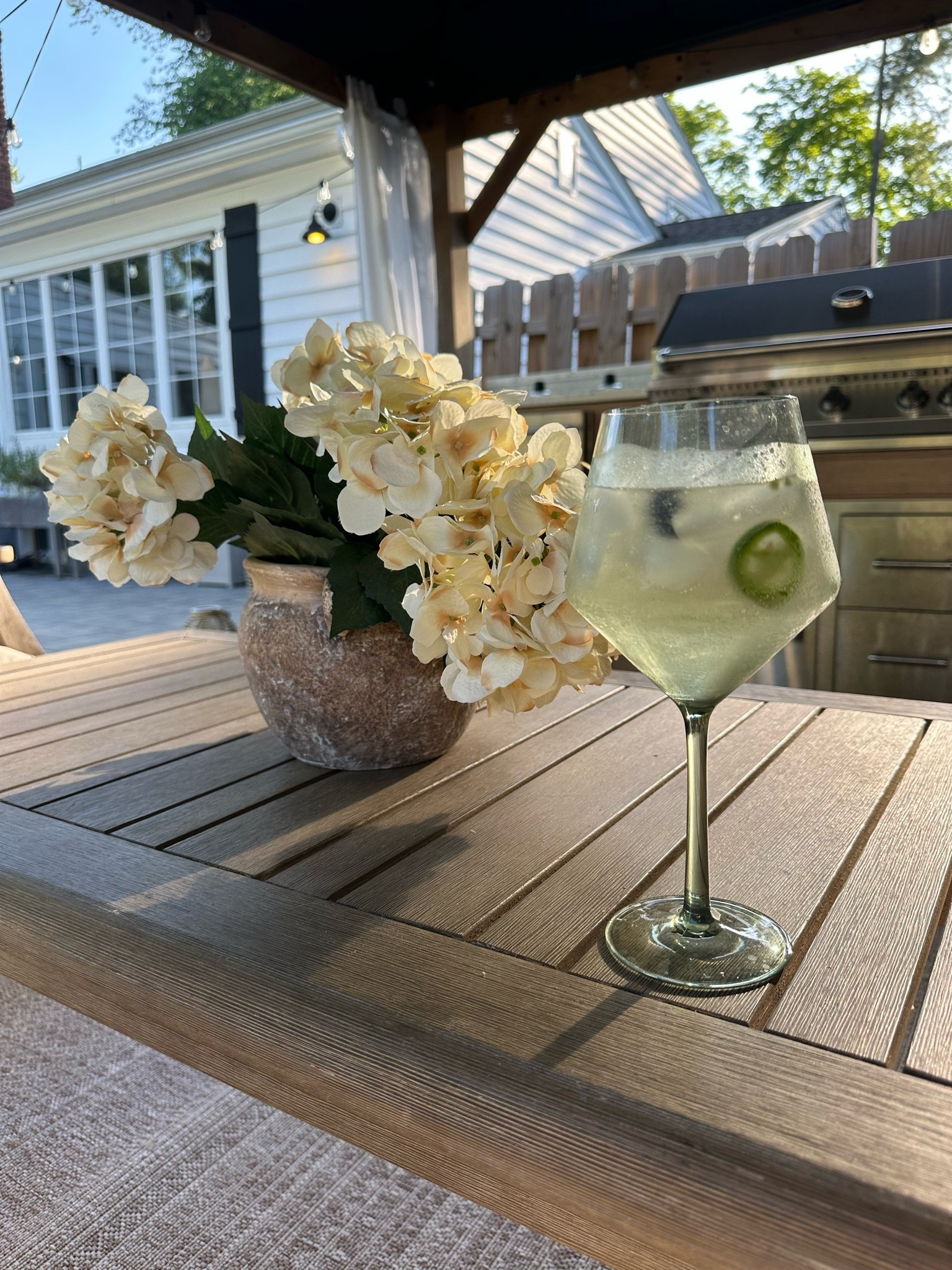 Plastic wine glasses with my spicey sauvy b spritzer and my faux hydrangeas.

#LTKSeasonal #LTKHome #LTKdayinmylife