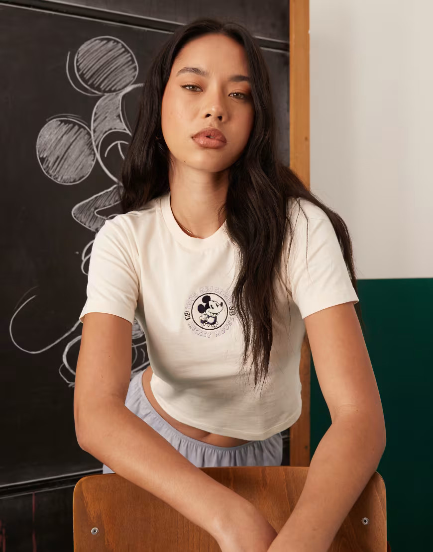 ASOS DESIGN Disney woman cropped t-shirt with Mickey Mouse print in beige-Neutral | ASOS (Global)