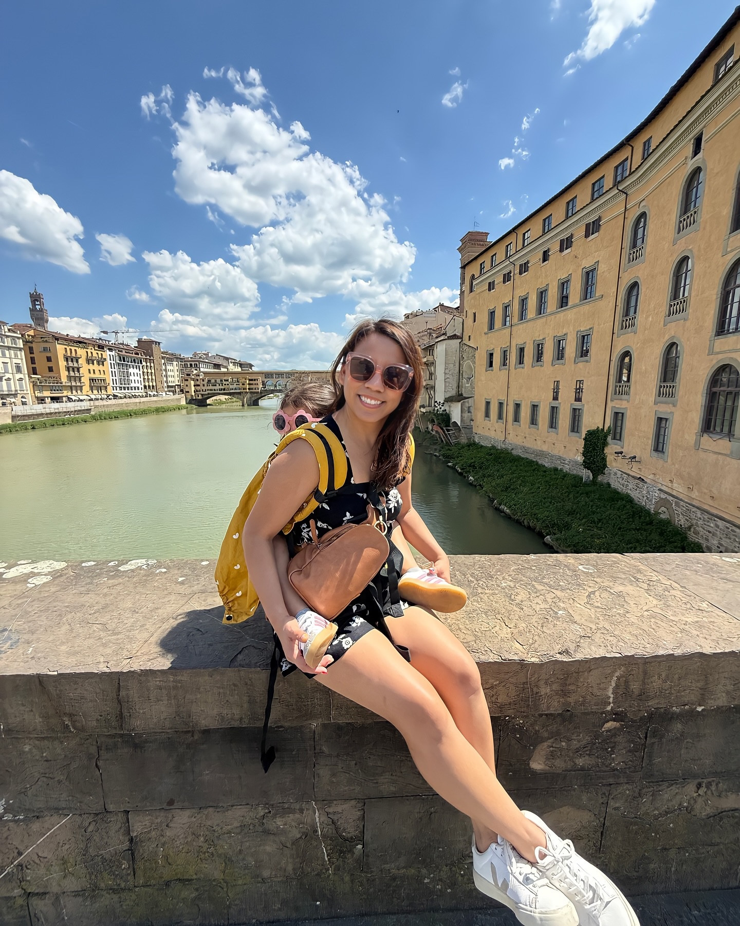 Catching up on our travel day from Rome to Florence from a couple weeks ago. We took an early morning train and it ended up being such a smooth and fun ride. It was around two hours, and the kids did great. They got orange juice and acted like they were on a flight. I had their Amazon tablets pre-loaded so they were set.

This was our first real test of carrying all our stuff through the streets of Italy. Zach was carrying his giant 40-pound duffel with the diaper bag stacked on top, and Koa in the carrier. I had my Cotopaxi backpack and the Calpak duffel, which I instantly regretted bringing. If I could go back, I would’ve switched my Calpak for a smaller personal backpack. Or even better, we should’ve just used a rolling suitcase and stacked the Calpak on top. Definitely would’ve done things differently next time.

Thankfully our Airbnb in Florence let us drop off our bags early, so we were able to explore right away. We grabbed pastries and I got my usual café latte, which was my go-to drink the whole trip. Every morning pretty much started with pastries and a latte, but after all that walking, I was definitely missing a full breakfast with eggs and hash browns.

We spent the rest of the day wandering around with no real plan. Explored shops, walked to Ponte Vecchio, had a wine and charcuterie lunch, and ended the day with gelato. Emy had her first cone and that was it and from then on she only wanted gelato if it came with a cone.

#FlorenceItaly #RomeToFlorence #ItalyRecap #TrainTravelEurope #ItalyWithKids #FlorenceWithToddlers #FamilyTravelMoments #PonteVecchio #LTKtravel #LTKfamily #Italy2025 #TravelMomLife #GelatoTime #TravelWithKids #FamilyAdventures