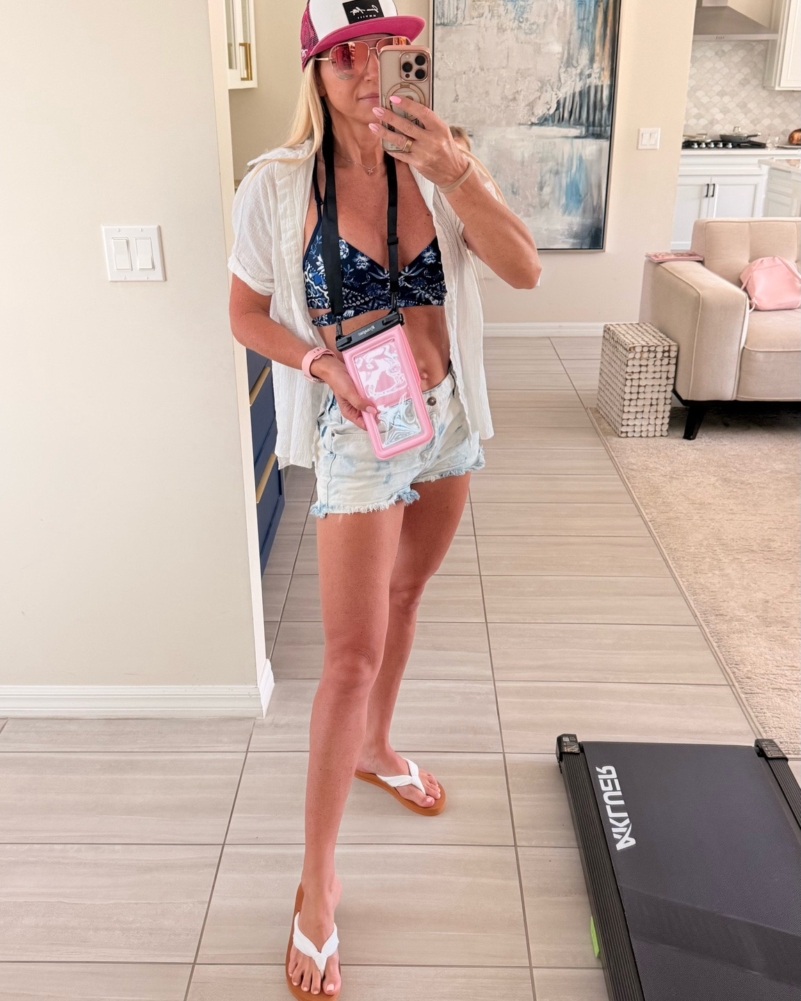 Another sporty water weekend outfit 🌊 I wanted something easy to throw over my swimsuit that still felt cute enough for the rest of the day.
The waterproof phone pouch and flip flops that don’t sink and I’m ready for another Jetski  ride! 


water sports outfit, beach cover up outfit, sporty beach outfit, swimsuit cover up, boat day outfit, casual beach style, summer weekend outfit, active swimwear, beach day outfit

#LTKootd #LTKActive #LTKU