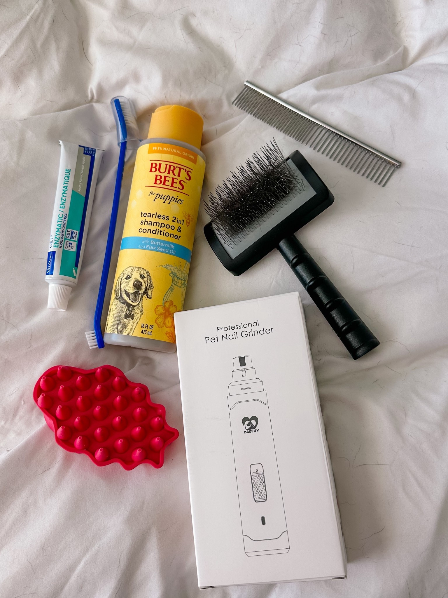 Puppy grooming essentials!! These have been awesome for our little lab, and I would highly recommend the slicker brush for those heavy coats!!! 

#LTKPets