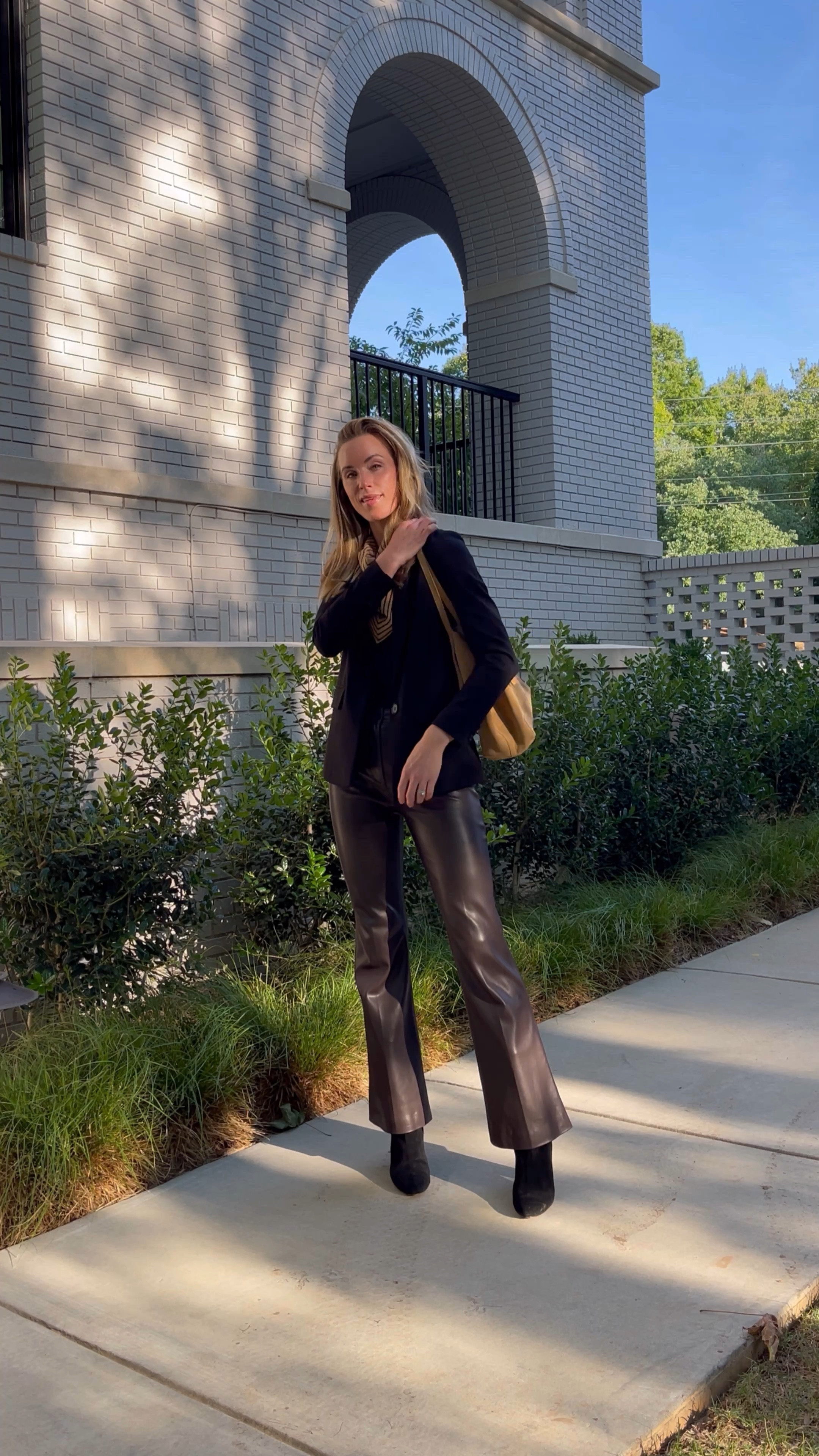 Daily look wearing Generation Love black blazer (old, similar linked), Abercrombie black bodysuit (I size up for length), Rebecca Taylor brown leather pants (similar, less expensive also linked), Toteme scarf, Banana Republic booties (leather version linked), Mango bag (old, similar linked).

#falloutfits #falloutfits2022 #leatherpants #blackblazer #widelegpants #brownleatherpants 

#LTKstyletip #LTKSeasonal #LTKunder100