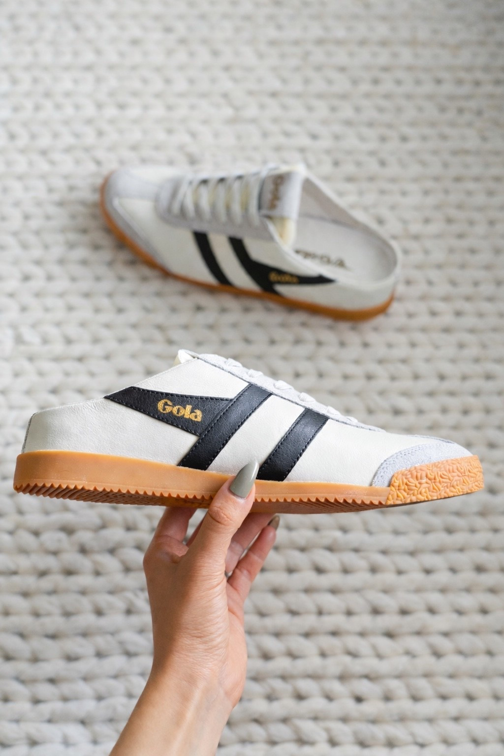 These are so good & such a fun Anthropologie exclusive find. The Gola Elan Mule Sneakers have been on my radar & I finally grabbed them. The suede upper with leather overlay details, black stripe, gold logo, & that old-school gum sole is such a perfect combo. They have the coolest retro heritage vibe but in a slip-on mule style which makes them so easy to throw on. Gola has been around since 1905 & honestly the craftsmanship shows. Obsessed. Linked in LTK!

sneakers - mule sneakers - slip on sneakers - Gola - Gola Elan - Gola shoes - Anthropologie - Anthropologie exclusive - retro sneakers - vintage sneakers - white sneakers - suede sneakers - leather sneakers - gum sole - sneaker mules - casual shoes - spring shoes - summer shoes - everyday sneakers - neutral sneakers - white & black - off white - retro style - heritage brand - British brand - 70s style - throwback sneakers - cool girl shoes - effortless style - casual chic - weekend style - spring style - summer style - street style - sneaker style - shoe obsessed - new shoes​​​​​​​​​​​​​​​​

#LTKootd #LTKU #LTKvlog