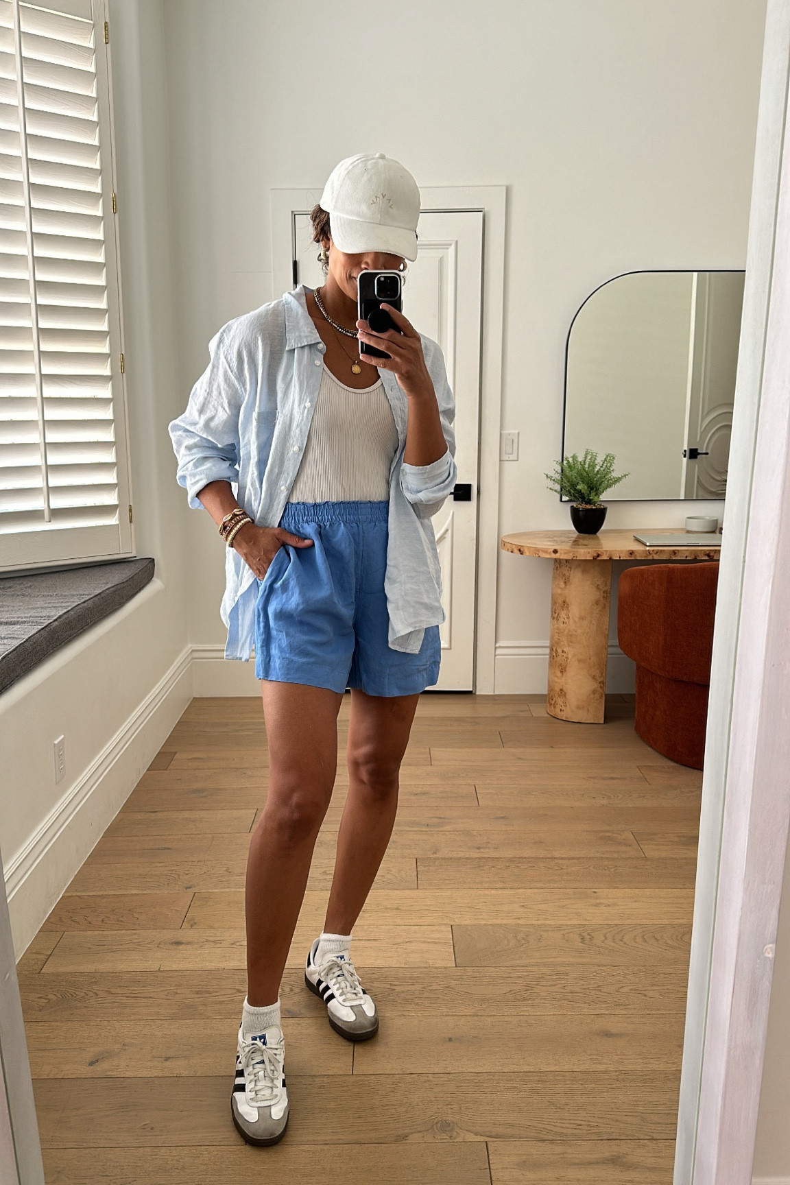 RESORT WEAR//linen blend button down and pull on shorts paired with a tank & sneaks. Wear both pieces as a bathing suit cover up too!! Sized up to an XL in the shirt and sized up to a medium in the shorts for oversized fits.



#LTKTravel #LTKStyleTip #LTKFindsUnder50