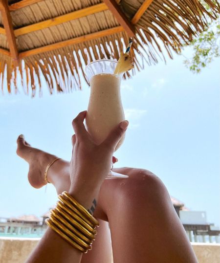 Never took these gold bangles off while on vacation at the beach. Great summer jewelry! Use code UPTOWNWITHELLYBROWN to save on entire purchase. 

#LTKFind #LTKtravel #LTKworkwear
