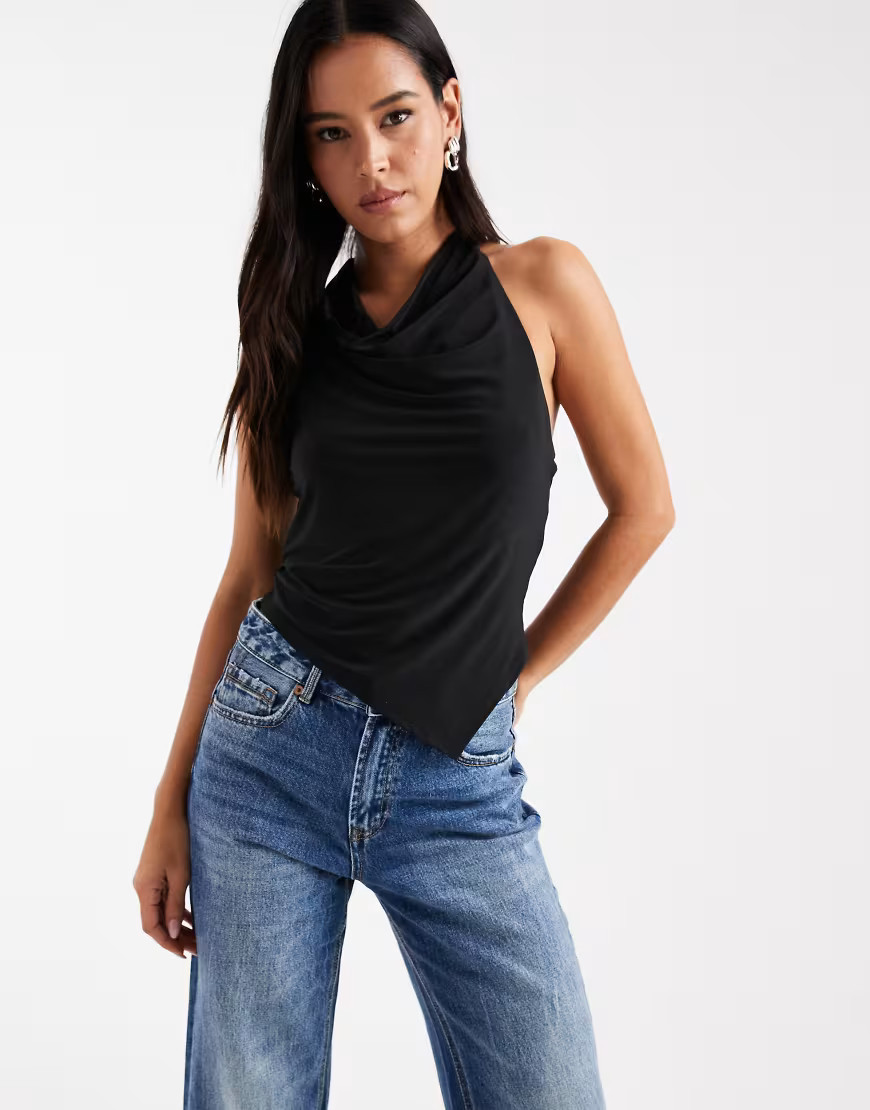 ASOS DESIGN slinky cowl halter neck top with asymmetric hem in black | ASOS (Global)