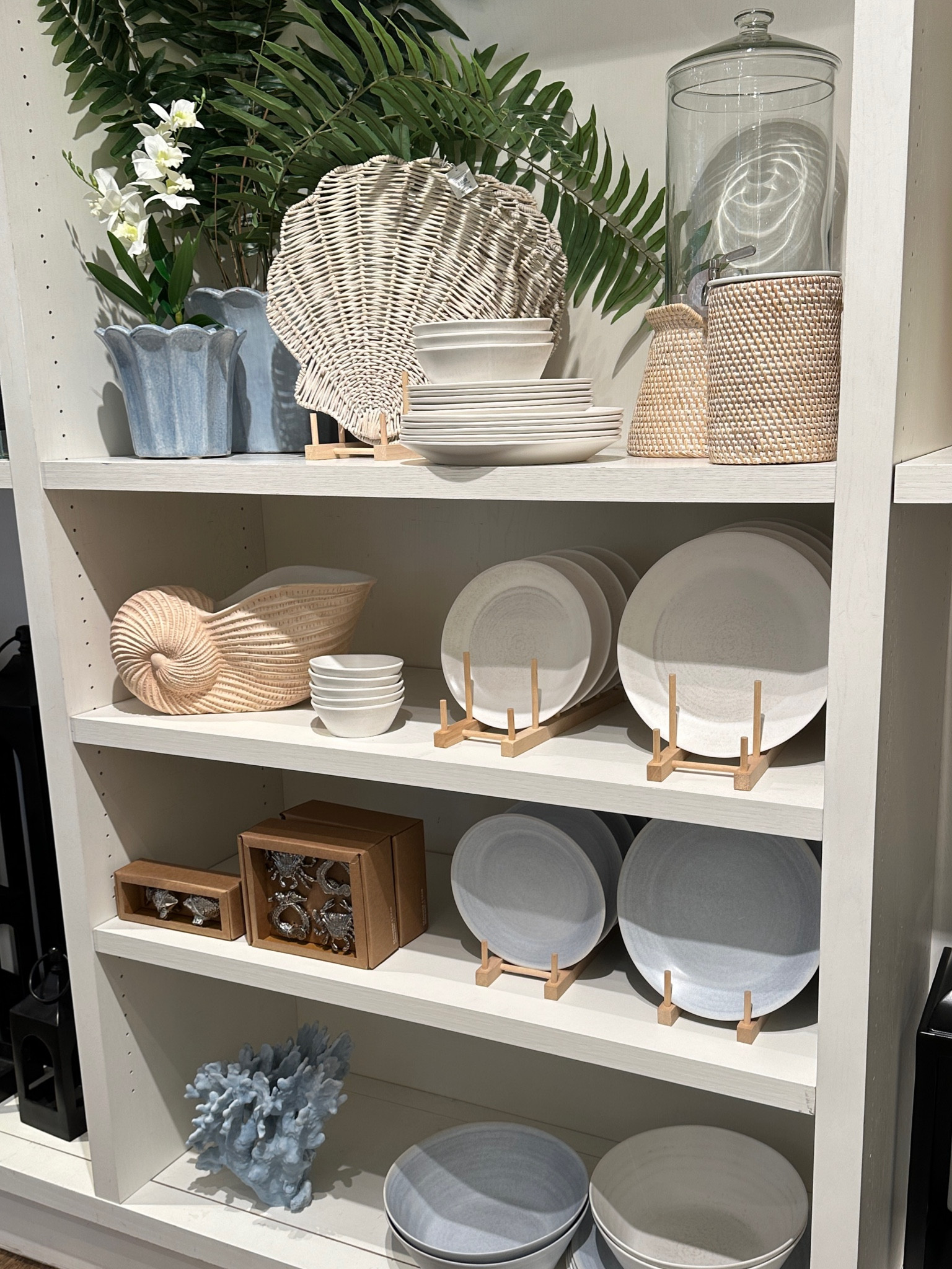 Coastal style home decor and table accessories displayed at Pottery Barn!   Coastal champagne bucket, rattan decor, fluted planter, shell decor, melamine dishes for outdoor dining and entertaining items.

#ltksummer #ltkspring #ltkpotterybarn #ltkcoastal 

#LTKstyletip #LTKhome 

#LTKSeasonal