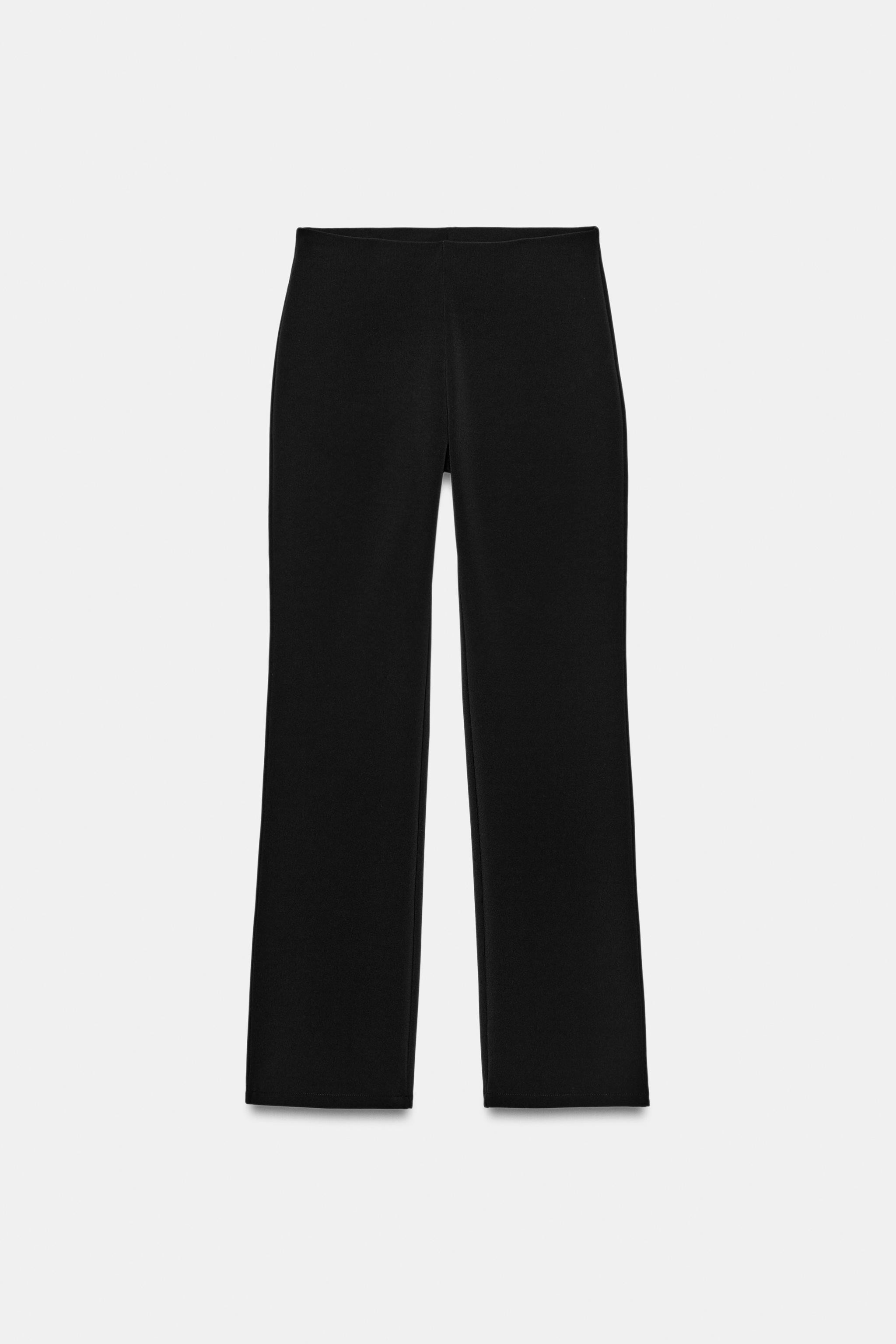 Model height: 177 cmMid-waist trousers with an elastic waistband. Patch pockets. Slim fit leg. | Zara UK