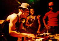 Charlie AhearnDJ Lovebug, Grandmaster Caz, Busy Bee photograph: Harlem 1980 by Charlie Ahearn pri...