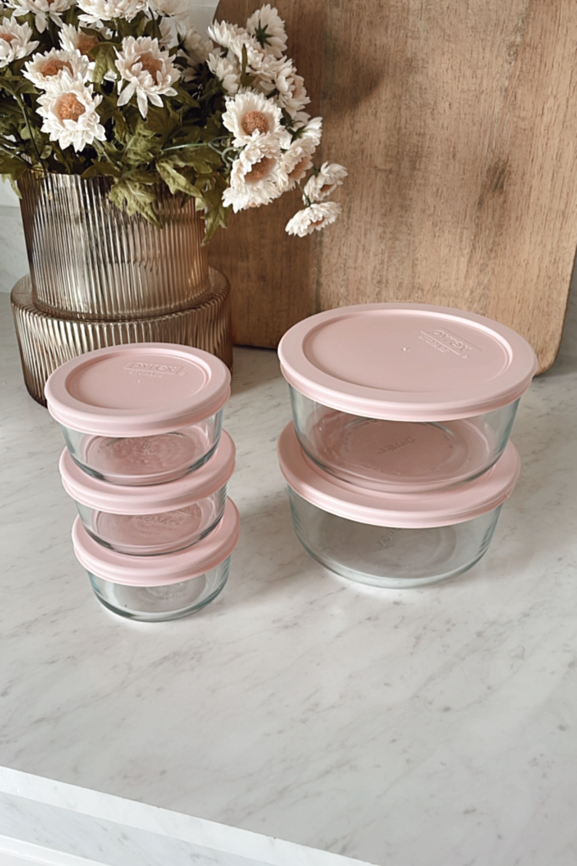 Pyrex round glass food storage containers with pink lids

#LTKFind #LTKhome #LTKSeasonal