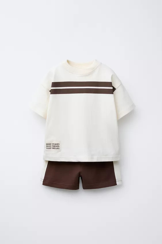 Two-piece set. Round neck short sleeve T-shirt. Label appliqué at hem. Bermuda shorts with elast... | Zara US