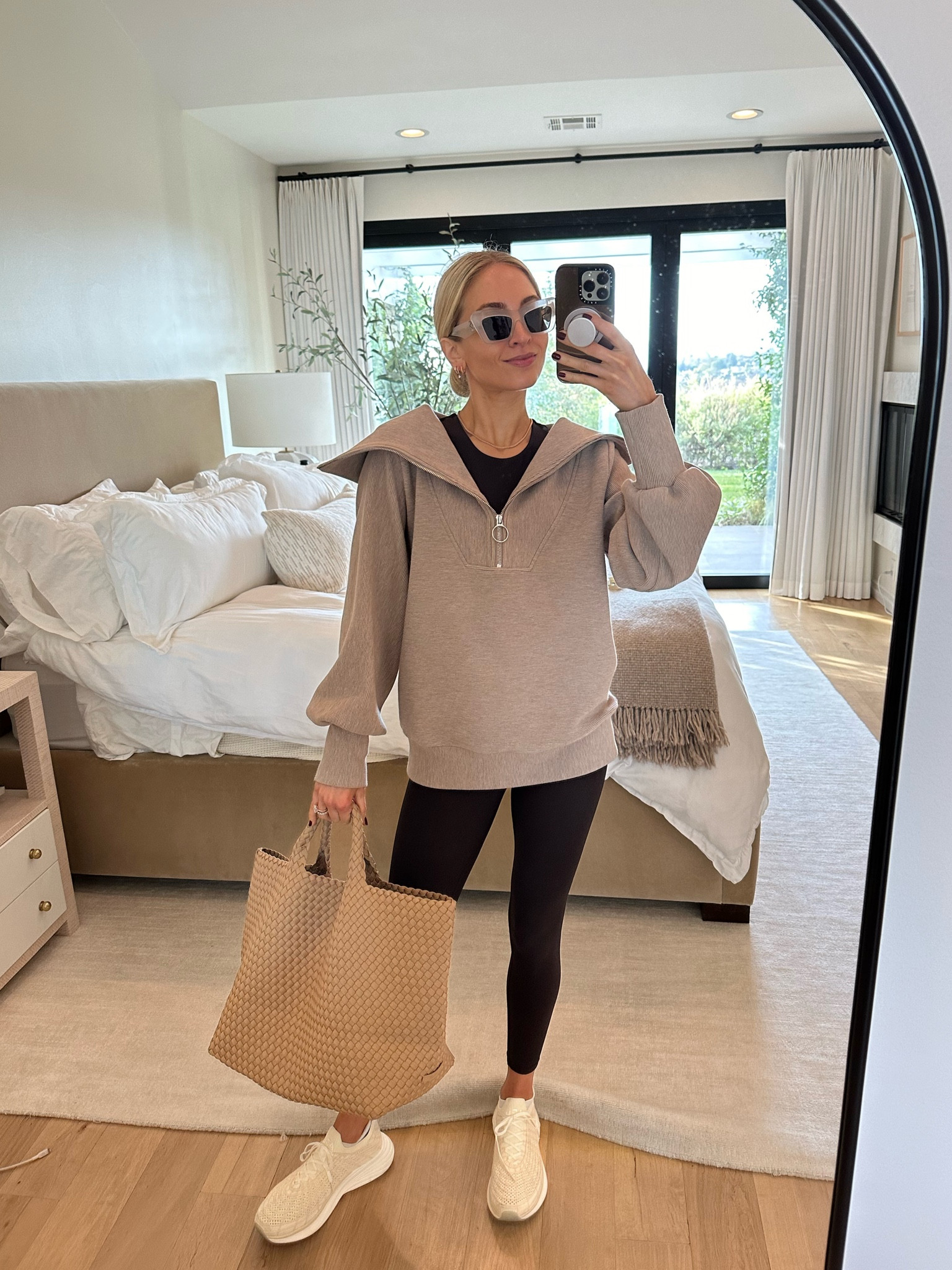 Headed to workout this morning in a chocolate brown ribbed set by Varley and a mauve sweatshirt.

FYI the bra top runs a little small - I sized up one to a Small! 

Sizes worn here:
Bra top S (runs a little small)
Leggings XS (TTS)
Sweatshirt XS (relaxed fit)
Shoes 9 (TTS)

#LTKfitness #LTKstyletip #LTKtravel