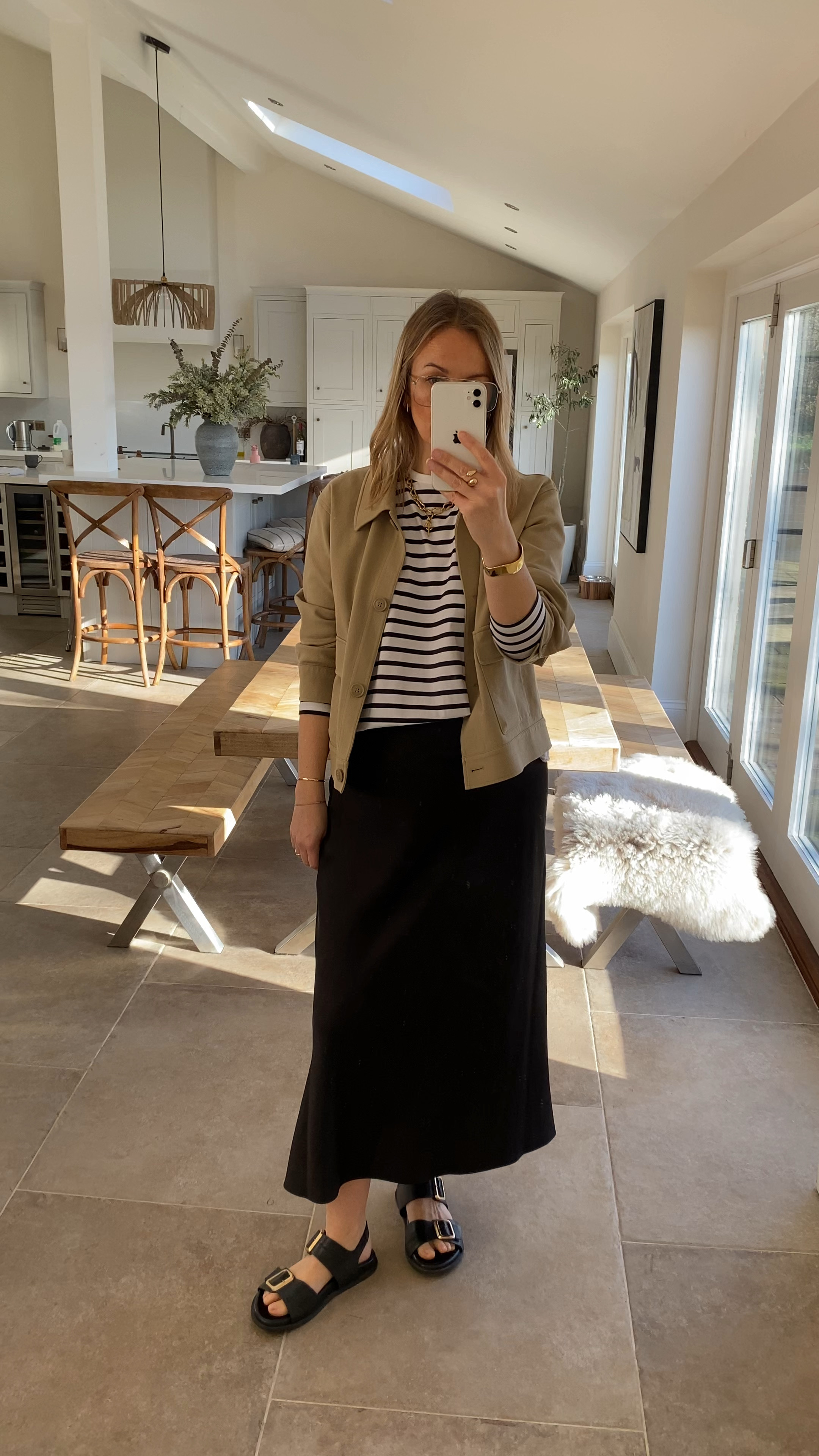 Best value transitional layering jacket 
Wearing a medium . Styled with a simple slip skirt (large) and stripe  T shirt. 
It’s early for sandals but if you’re looking for a new pair these ones are the most comfortable sandal you’ll ever wear! Beautiful quality with excellent reviews. 

#LTKFashionMonth #LTKspring #LTKtravel