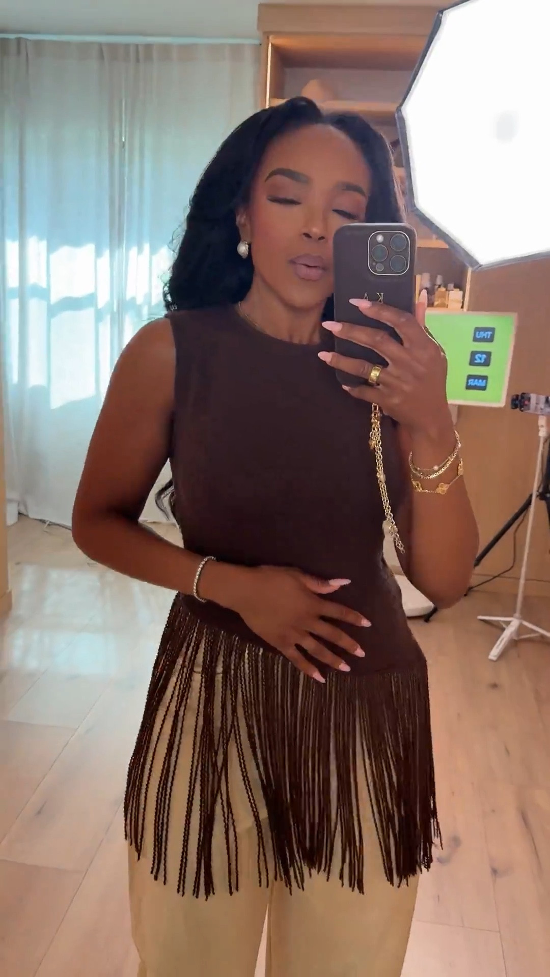 Scroll to shop this neutral outfit featuring a statement fringe top paired with relaxed wide-leg trousers for an elevated everyday look.

Perfect for dinner plans, date nights, vacation outfits, or an elevated casual look.

#LTKdayinmylife #LTKPetite #LTKootd