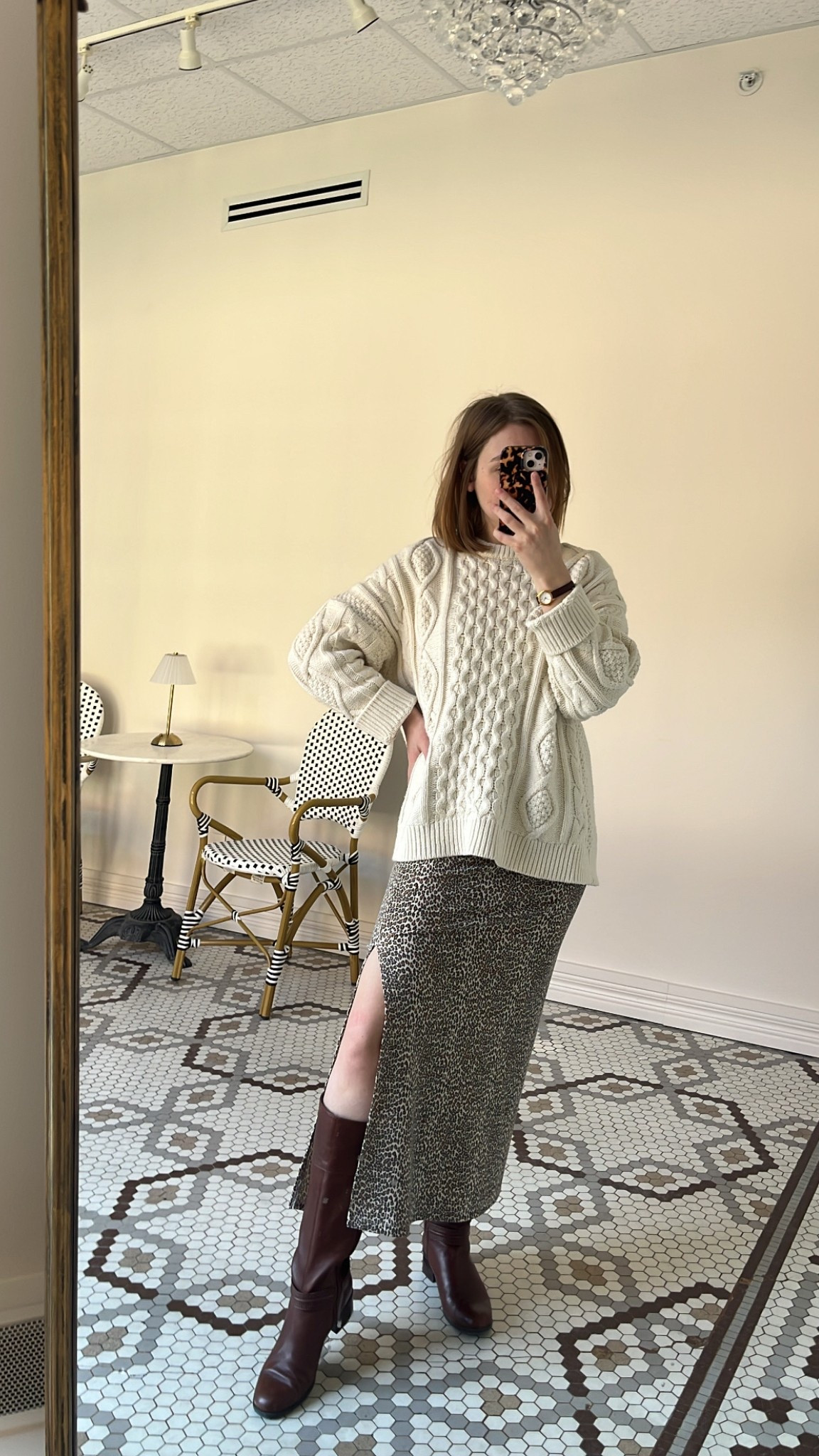 Mix and match your winter and spring pieces for a transitional look. I love doing this when I’m ready to wear my new pieces, but the weather isn’t cooperating.
-Cassie, MCO content coordinator

Pair a cable knit sweater with a leopard print skirt. Then, add a tall pair of riding boots for a Western Chic Touch. Accessorize with a timeless (and practical) leather watch.

#LTKStyleTip #LTKSeasonal #LTKShoeCrush