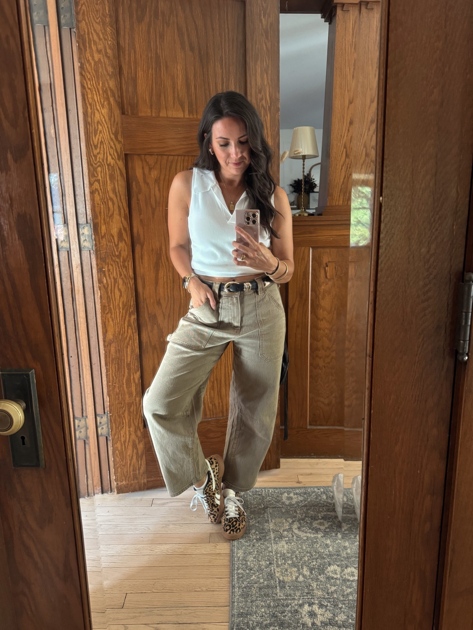 Keeping it simple for our weekend trip to Indy today ✨ casual outfit with wide leg pants, sleeveless knit top, gold jewelry, and leopard sneakers. An easy neutral look you can wear on repeat. 🐆


#LTKStyleTip #LTKSeasonal #LTKTravel
