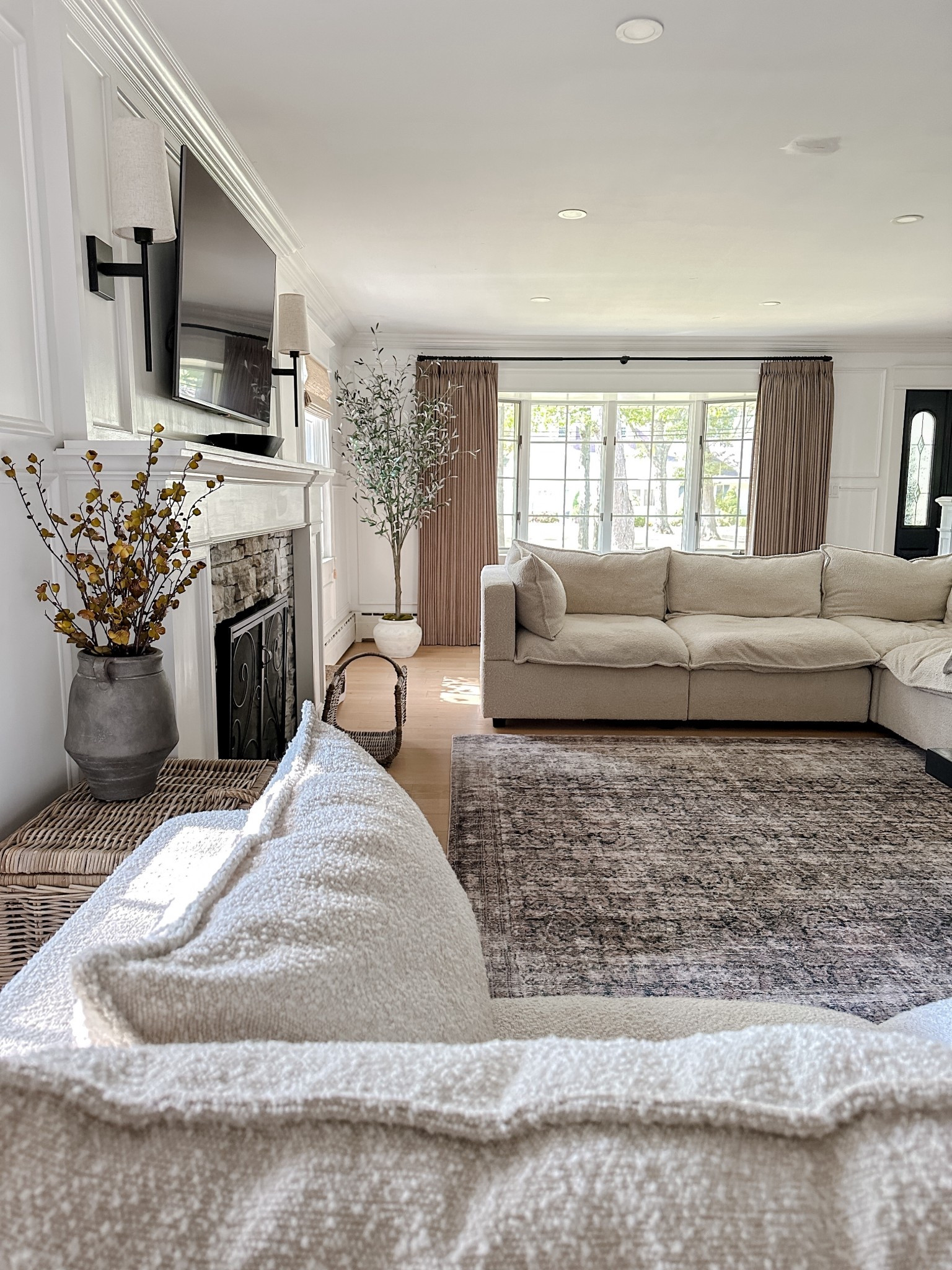 This is an oldie but a goodie featuring my alabaster boucle sofa and sectional with the softest area rug. It’s practically stain resistant! I love the earth tones and texture. 🤎

living room furniture | decor | drapes | curtains | vase | olive tree | scone lights

#LTKHome #LTKSaleAlert