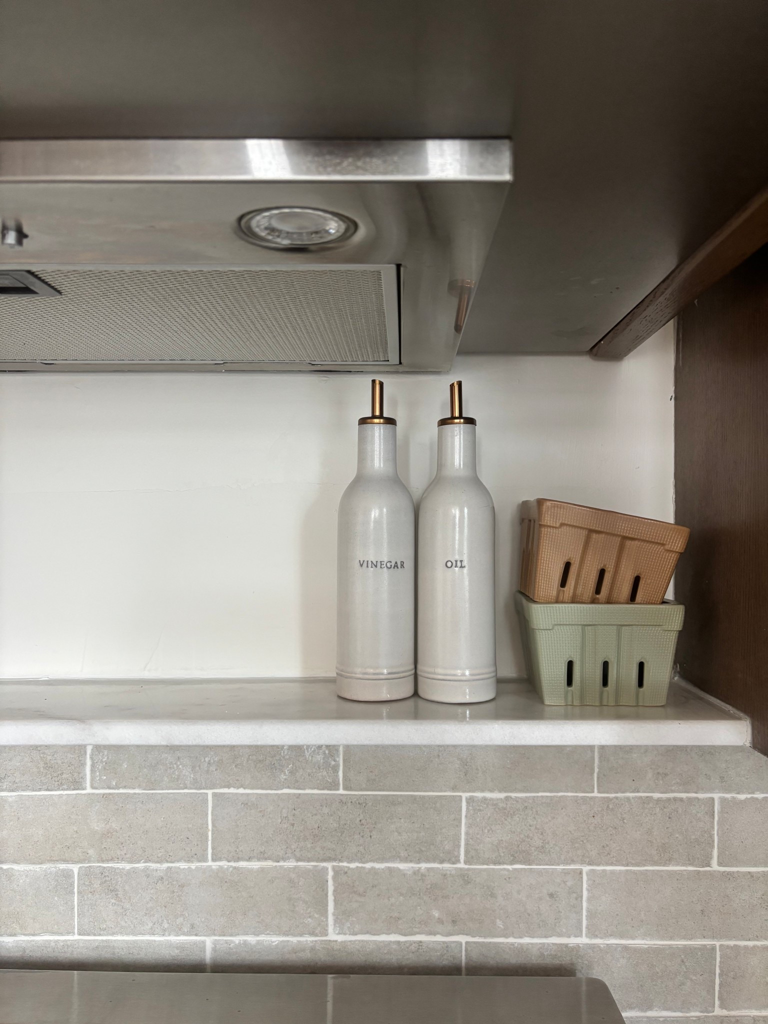 Kitchen renovation with marble ledge and brown cabinet 
Olive oil target find 
Neutral home wear 

#LTKSummerEdit #LTKHome #LTKFindsUnder100