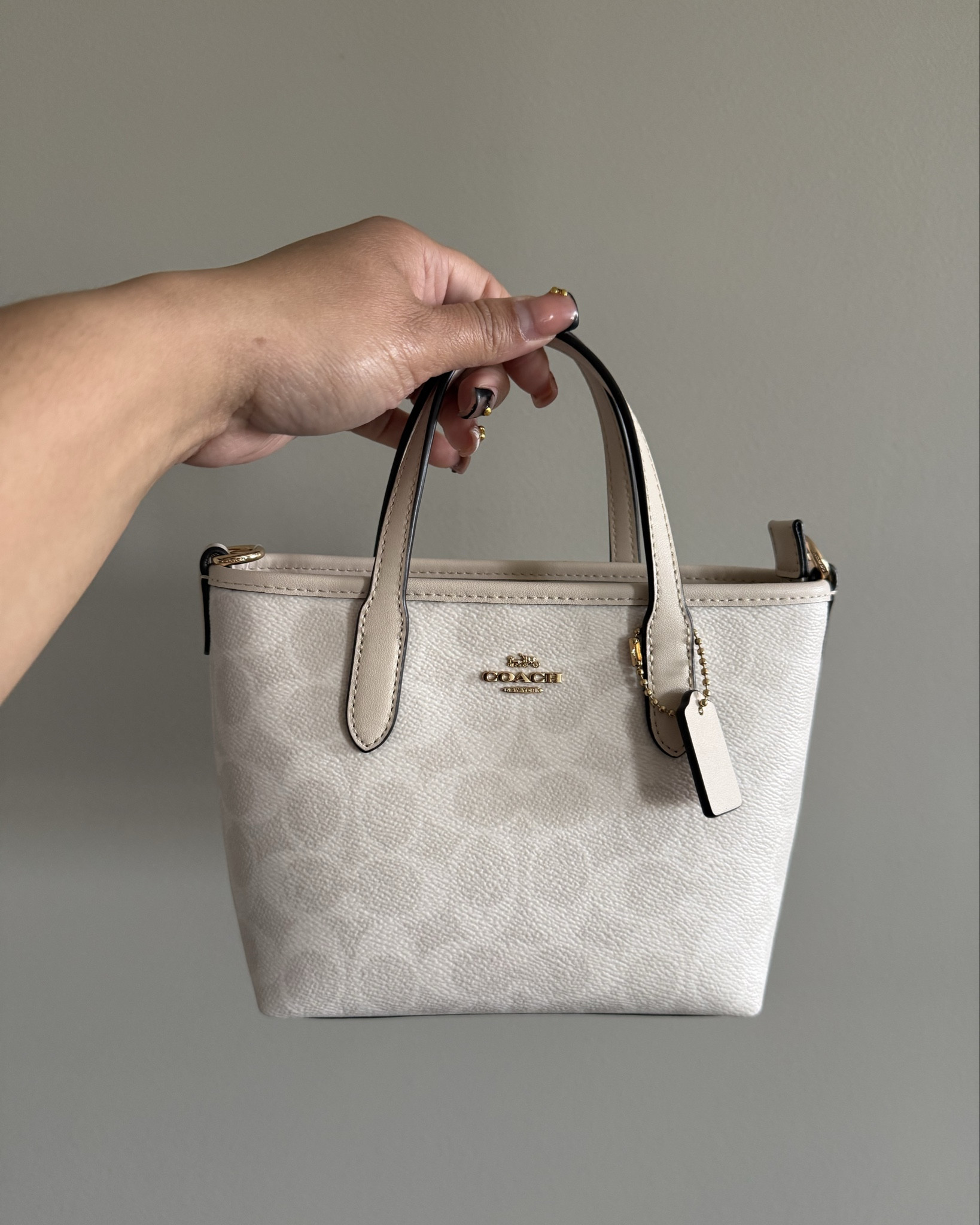 Purchased this coach mini city tote a while back and nowwwww it’s back in stock . It’s the perfect tiny purse for on the go  . 

#LTKHoliday #LTKSaleAlert #LTKU