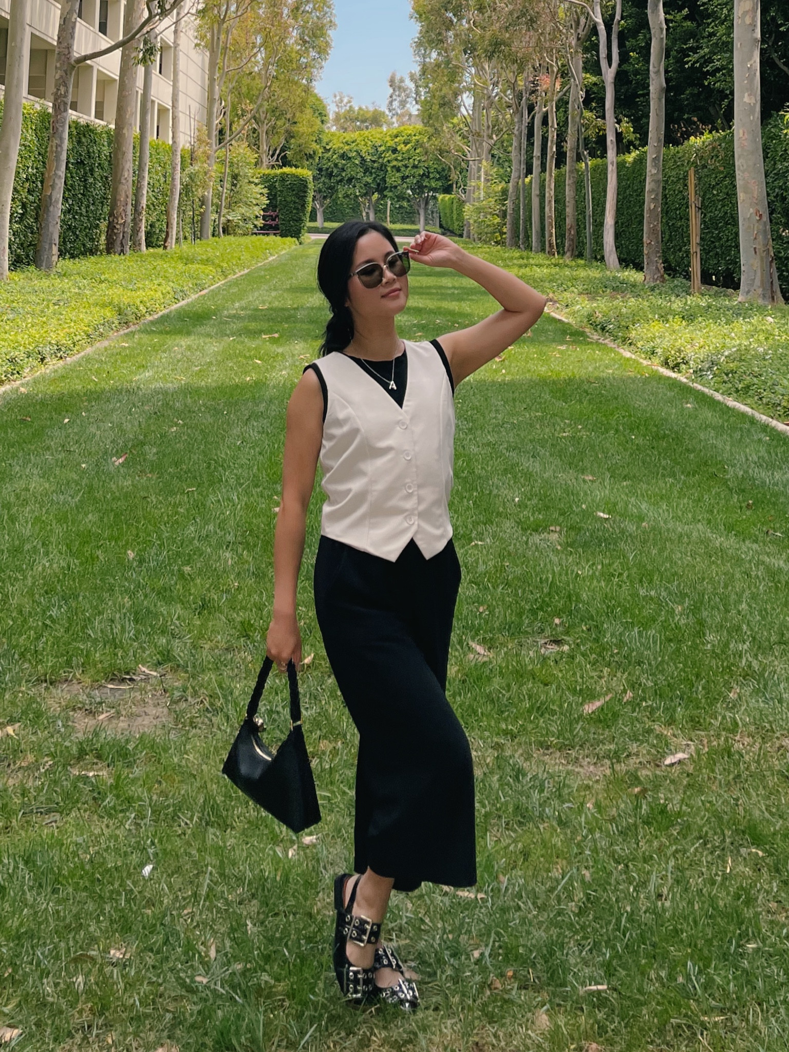 Teacher Outfit features white vest with matching all black cropped top and culottes and black shoes and bag 🖤🤍 

#LTKStyleTip #LTKFindsUnder100 #LTKBacktoSchool