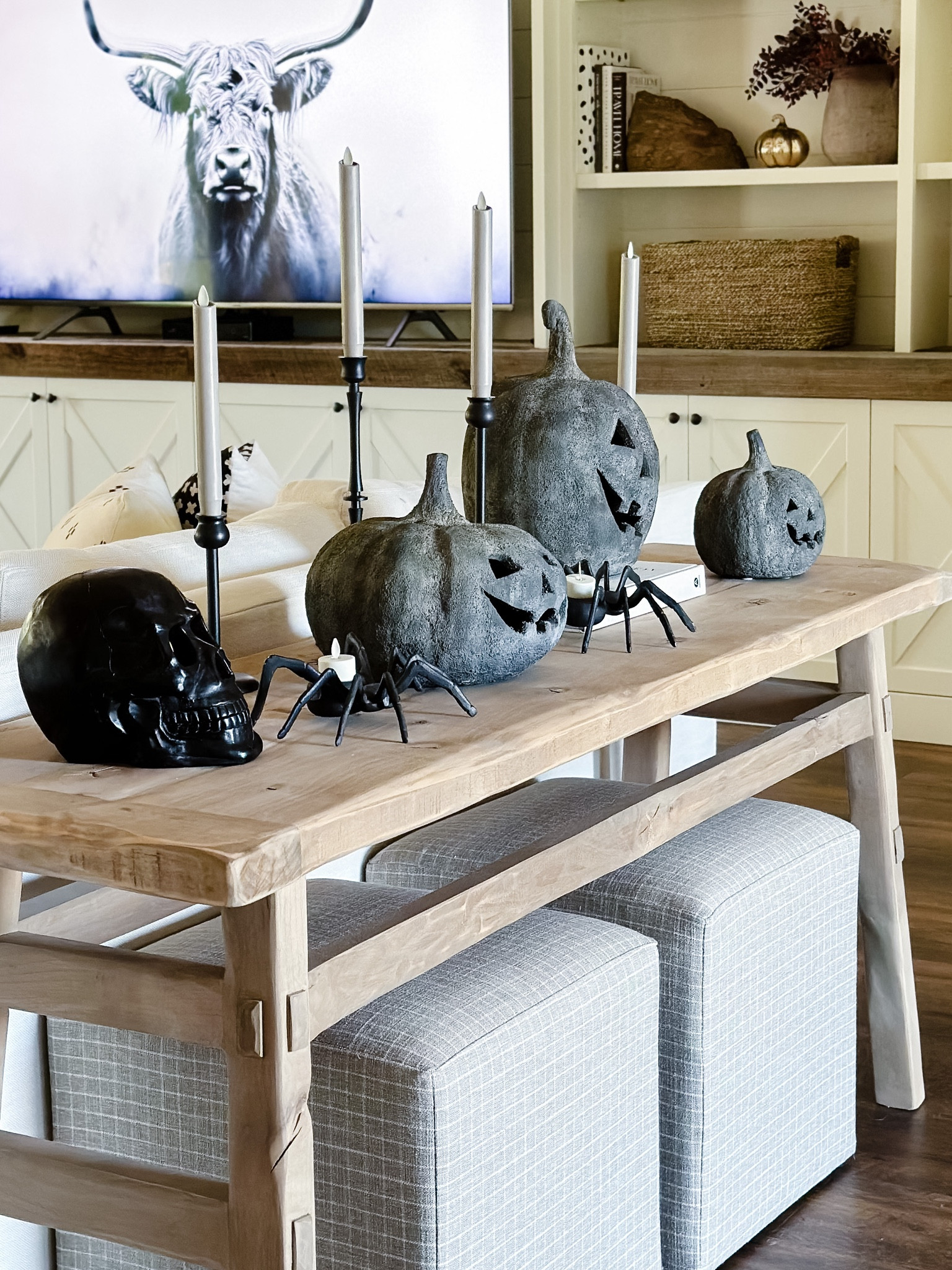 Halloween console table styling

Jack o’ lantern
FLAMELESS skull candle
Upholstered ottoman
Fall home decorr

#LTKStyleTip #LTKHome #LTKSeasonal