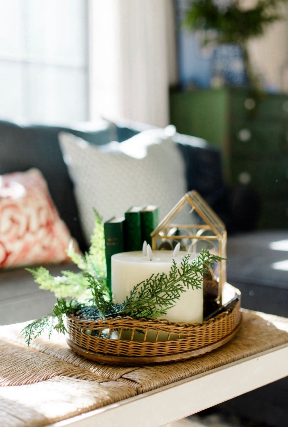 Simple winter decor! Greenery, vintage tray, battery operated candle, terrarium and books on our coffee table. Cozy vibes!

#LTKhome #LTKfindsunder50 #LTKSeasonal