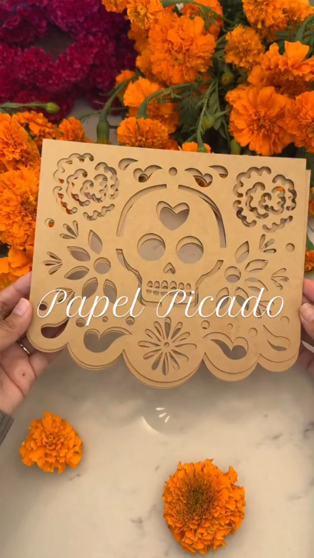 🧡✨Papel picado for Día de Muertos 🏵️🌼🕯️

Materials I used:
	•	65lb cardstock paper
	•	Cricut machine
	•	Cricut app papel picado template

DIY Steps:
	1.	Choose your papel picado template on Cricut.
	2.	Load your cardstock and let the machine do the cutting.
	3.	String your pieces together and hang above your altar or doorway.

Full tutorial coming soon! 🧡✨

#díademuertos #papelpicado #dayofthedead #dayofthedeadaltar #altardemuertos