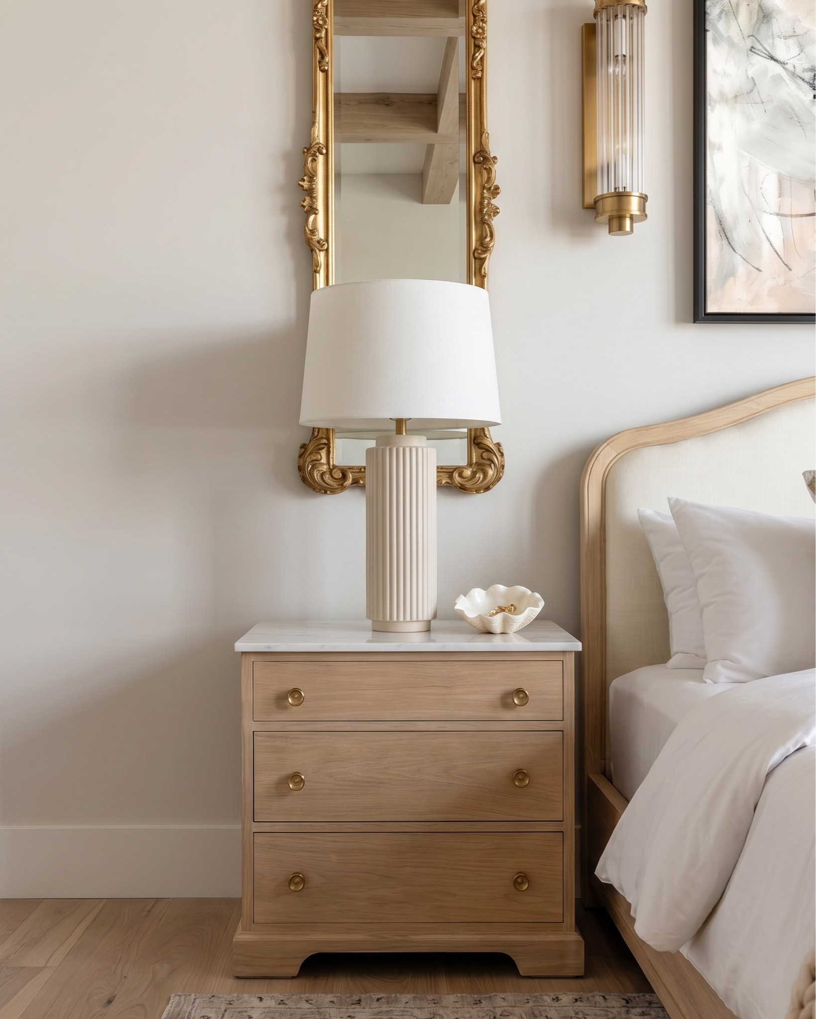 * light wood bed frame
* curved wood headboard
* white bedding set
* cream knit throw blanket
* beige patterned lumbar pillow
* white standard pillows
* boucle bench ottoman
* light wood nightstands
* fluted ceramic table lamps
* white drum lamp shades
* gold wall sconces
* gold chandelier
* vintage gold wall mirrors
* neutral abstract wall art
* beige area rug
* decorative bowl decor
* solid wood dining table
* pedestal dining table base
* cane back dining chairs
* upholstered seat dining chairs
* neutral textured area rug
* gold chandelier lighting
* wood sideboard cabinet
* arched glass cabinet
* ceramic table vase
* floral arrangement centerpiece
* table styling decor


#LTKHome #LTKSaleAlert