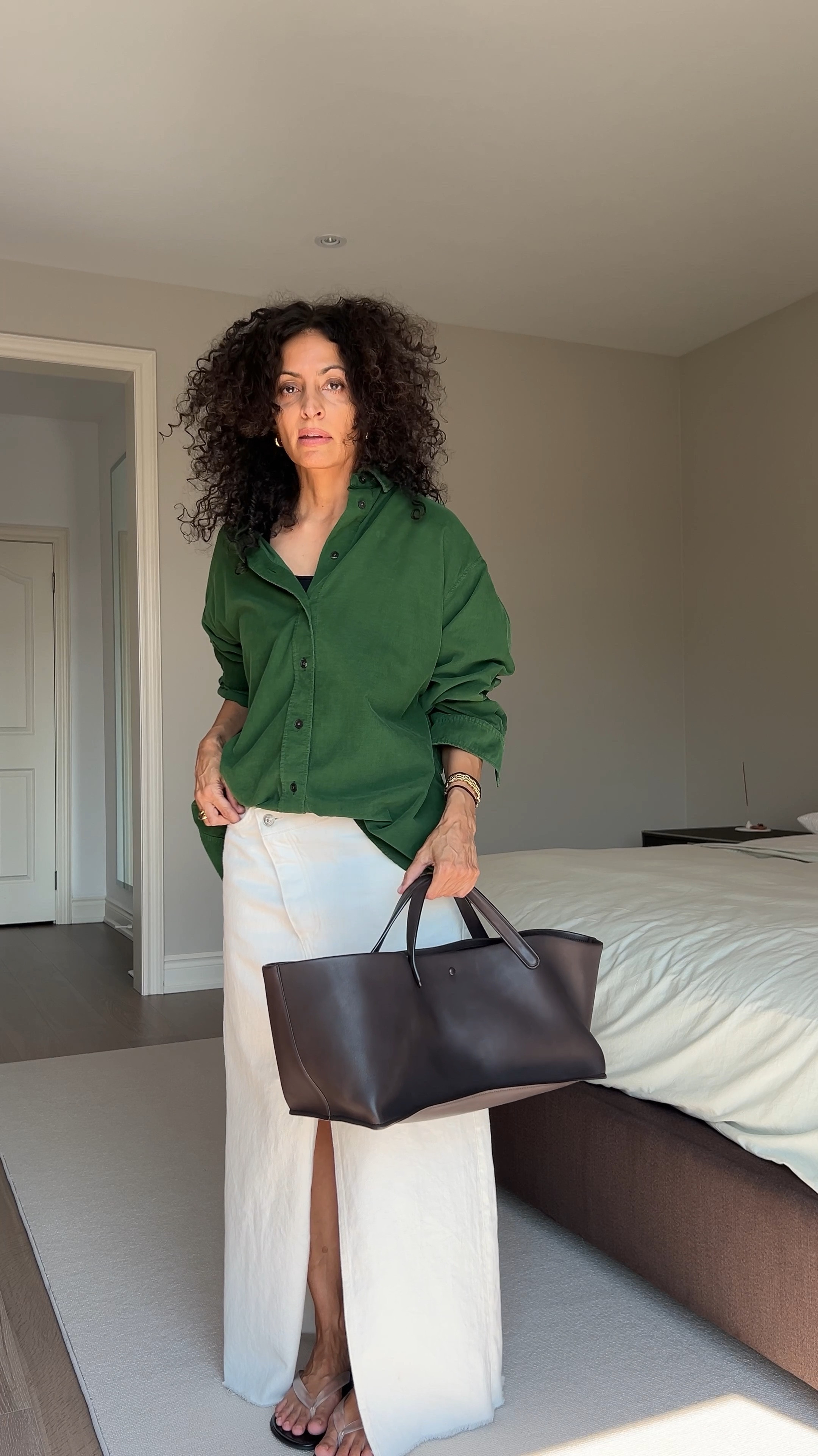 Penna is oversized and you could go up in size and roll the sleeves if need be.  Go up in size for the skirt to achieve the same effect.  Bag is by The Row (Idaho).