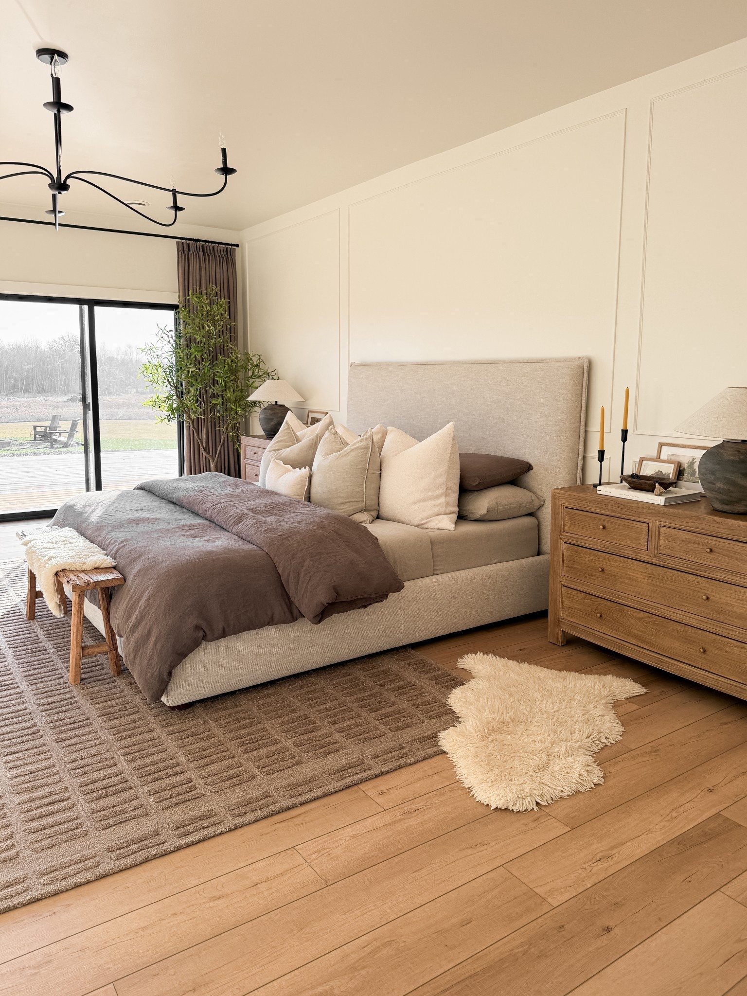 Earthy tones and soft textures are everything in this bedroom!
The cocoa rug grounds the space while the linen bed frame and layered linens keep it feeling light and relaxed.

#LTKhome #LTKsale #LTKstyletip