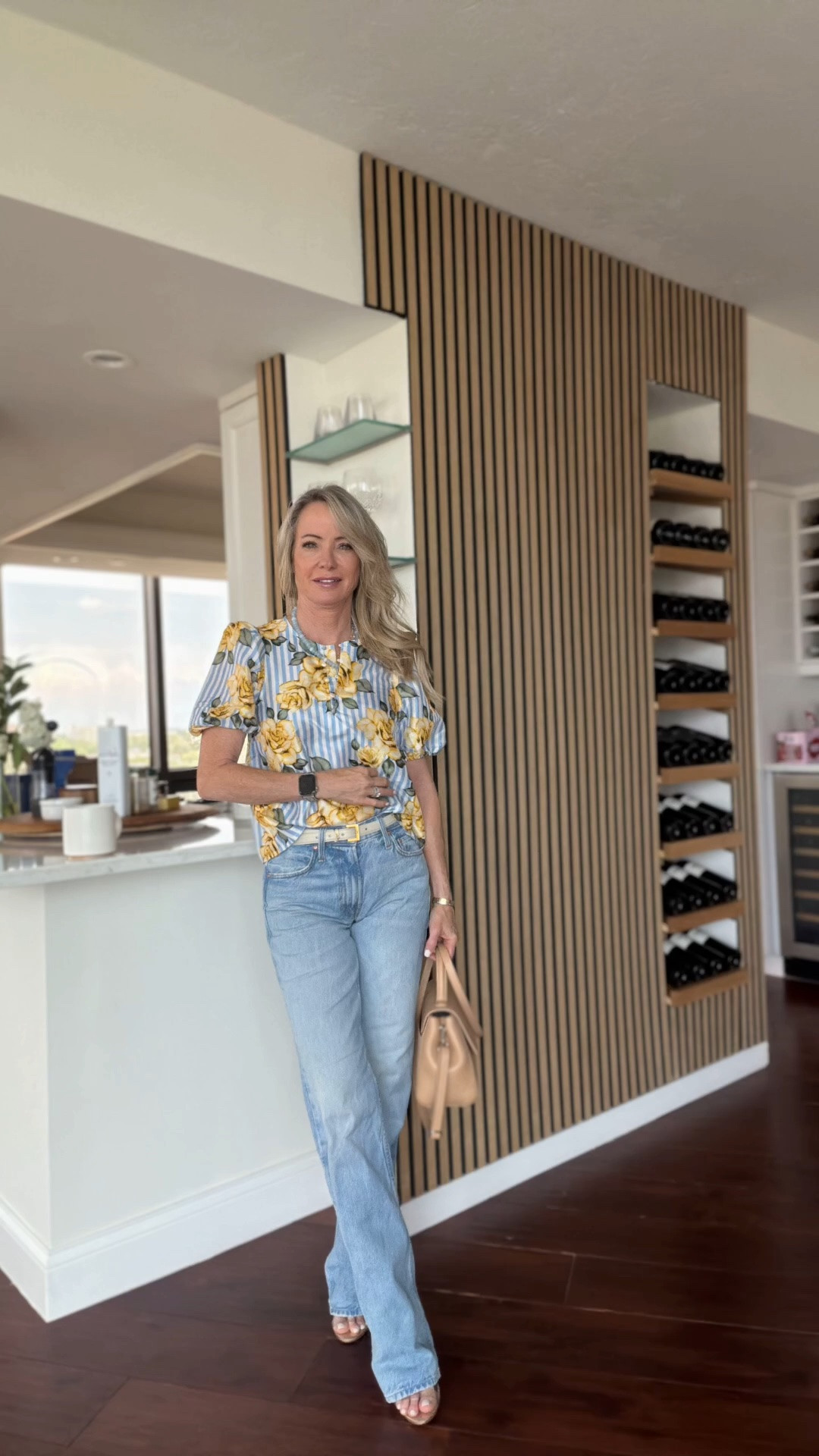 An easy outfit formula I come back to again and again: a feminine floral top, relaxed light-wash denim, neutral accessories, and comfortable heels. Classic pieces that feel polished without trying too hard.