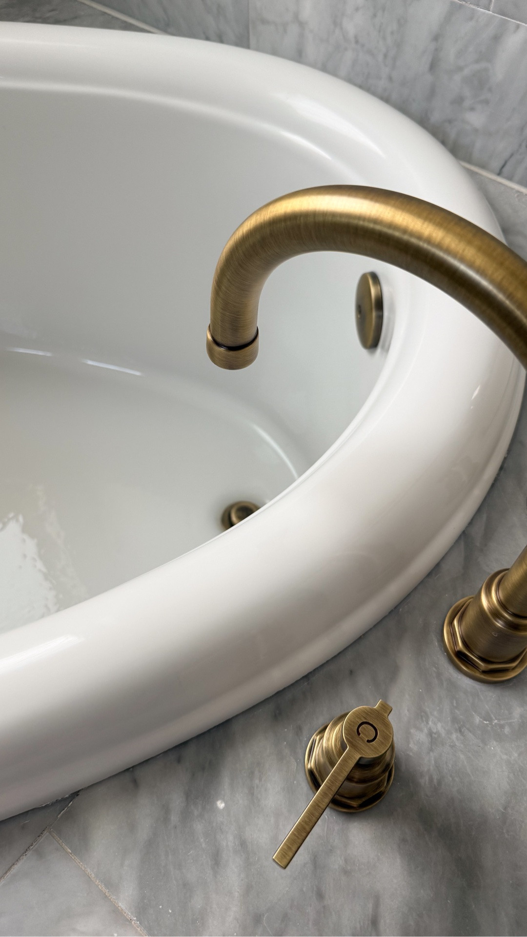 My tub faucet is in the aged brass finish. If it’s no longer available on Wayfair you can still find it on signaturehardware.com

Roman tub filler faucet, brass bathroom faucets

#LTKHome