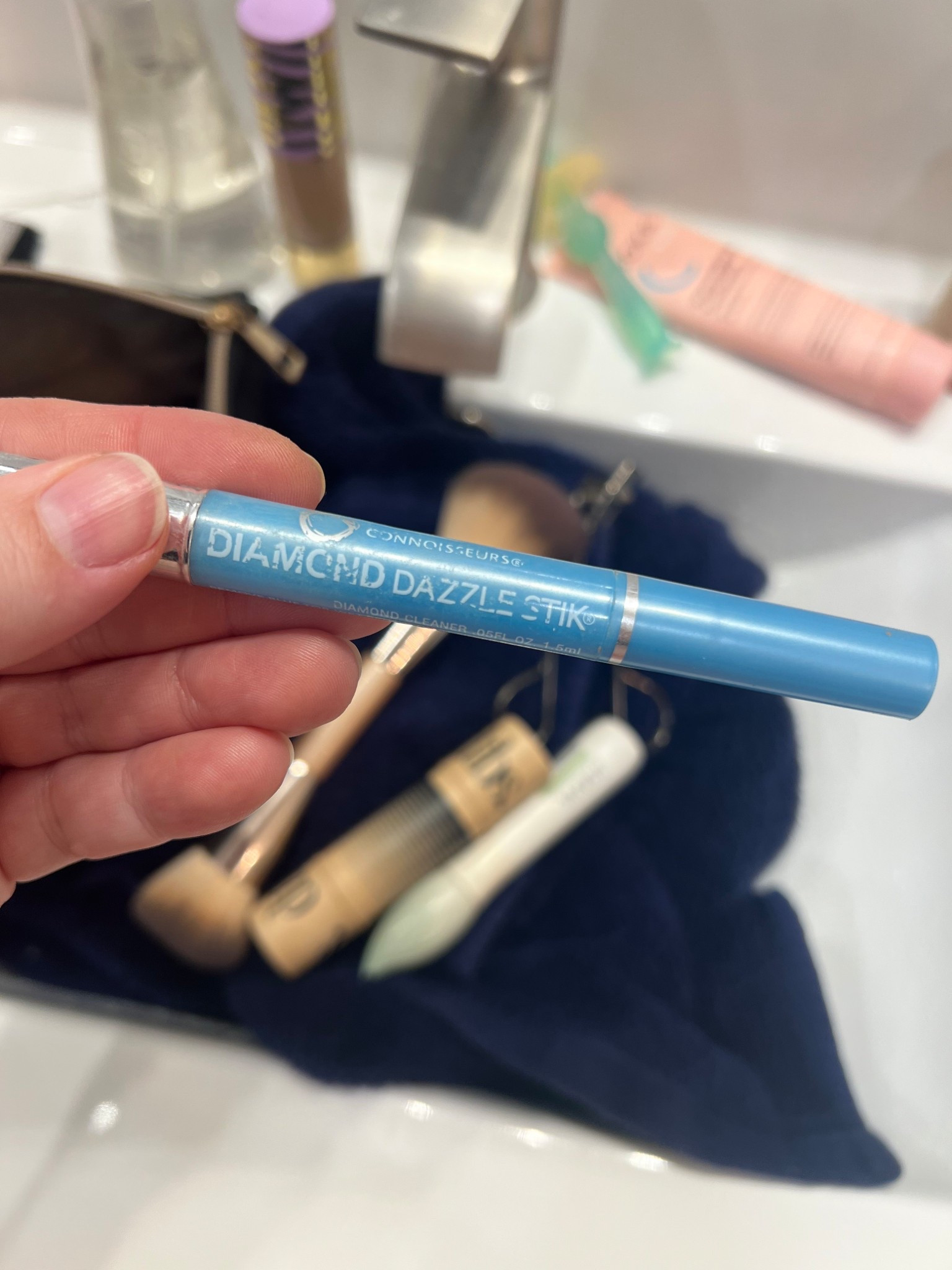 The best tool to keep in your makeup bag!! 

Ring cleaner 
Stick ring cleaner 
Amazon find 