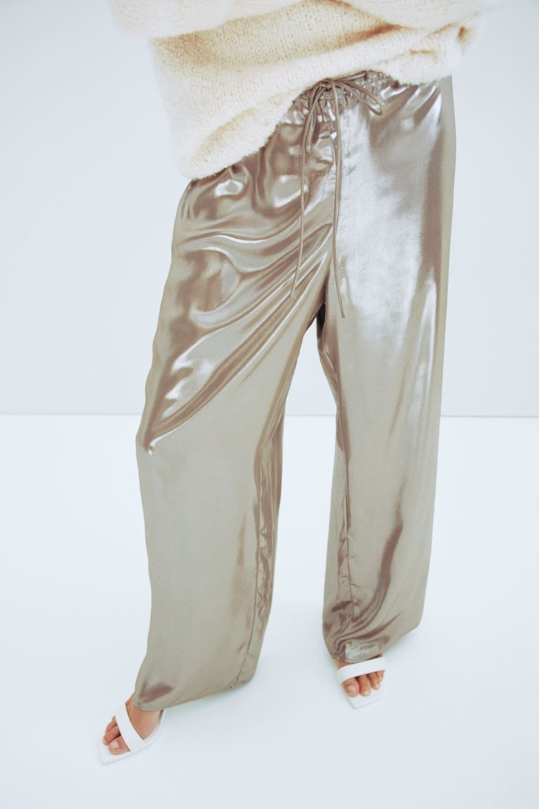 Shiny trousers - Beige - Ladies | H&M GB | H&M (UK, MY, IN, SG, PH, TW, HK)