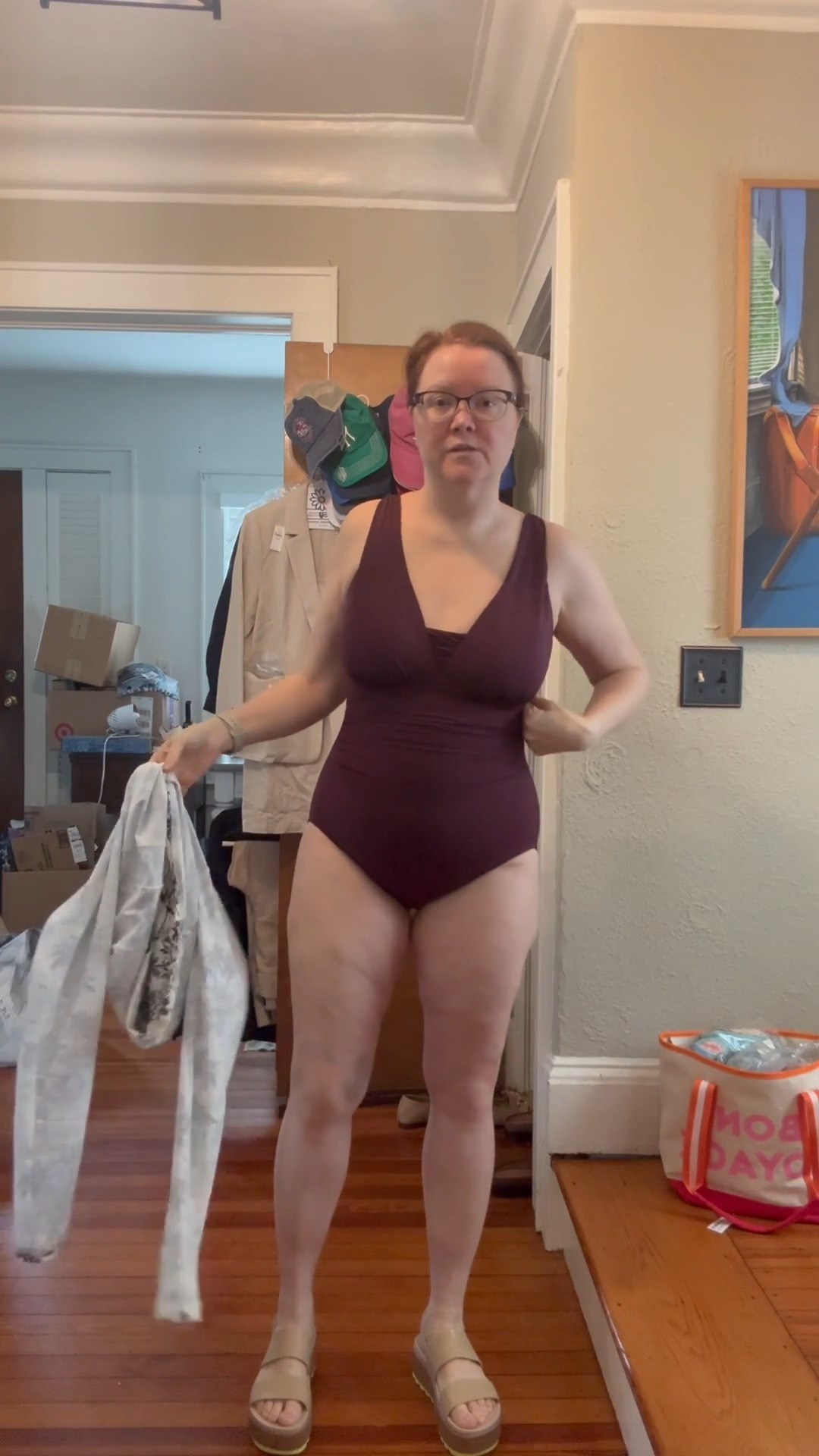 Sale alert 50% off everything at LANDSEND.  Sophisticated and Super slimming one piece Swim suit is size 14 and cropped rash guard aka swim shirt is medium. Comes in black and also in blackberry in addition to this wine shade. Loads of compression to help trim tummy area.  Nice amount of support even though there is no underwire.  I’ll file this worth the investment.  This has much better quality and is way more flattering than my budget buys.  Grab these while they’re on sale! Straps are NOT adjustable but seem snug. Platform water shoes are from reef and are amazing!  I own every color!  Those run big so size down one half size in the sandal.  Size up in swimwear from LANDSEND.  All swimwear runs slim and small there IMO.  

#LTKMidsize #LTKSaleAlert #LTKSwim