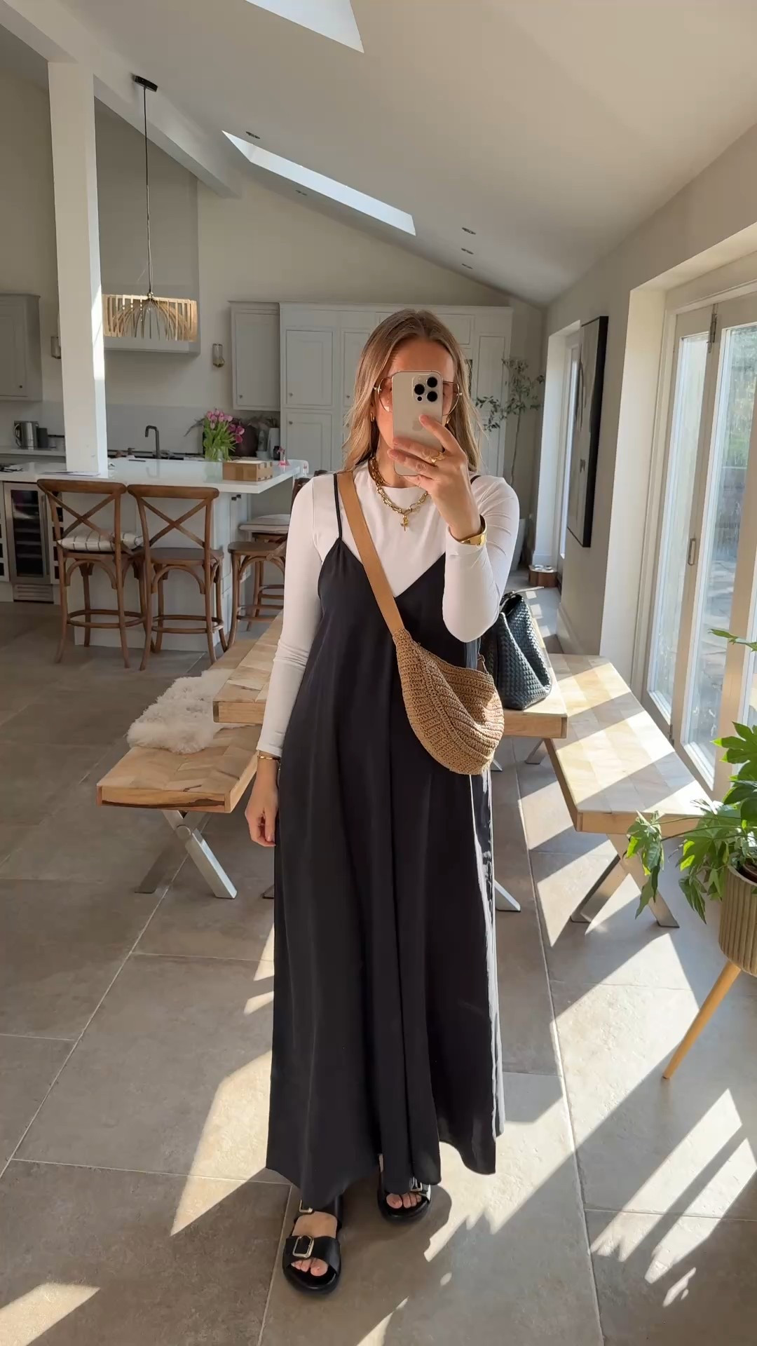 Perfect with a long sleeve layer worn under. 
Wearing a small in the dress
Top is old Abercrombie but I’ve linked similar . 
Bag old uniqlo again I’ve linked similar . 
Sandals air & grace - the most comfortable cushioned supportive sandals you’ll buy x 

#LTKstyletip #LTKsummer #LTKspring