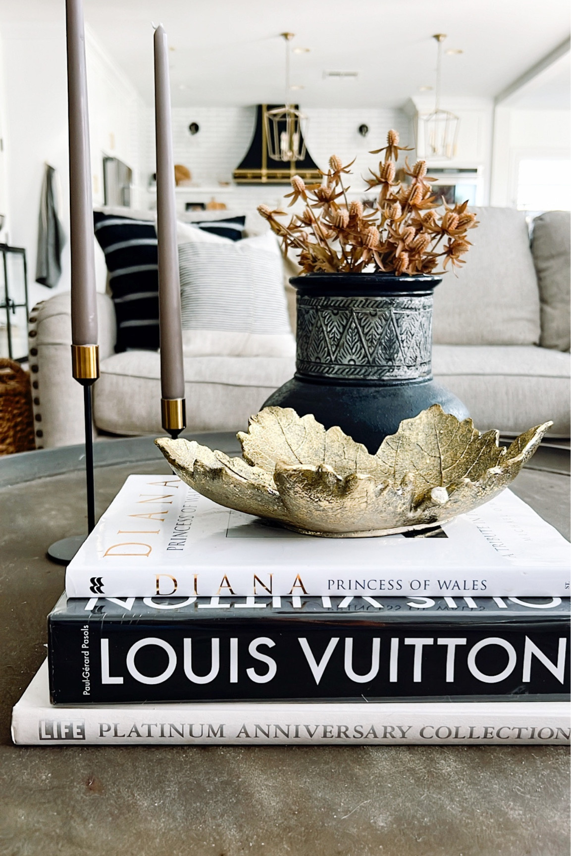 Fall coffee table 

Coffee table styling 
Home 
Fall decor
Maple leaf decor
Coffee table books
Candlesticks 

#LTKstyletip #LTKSeasonal #LTKhome