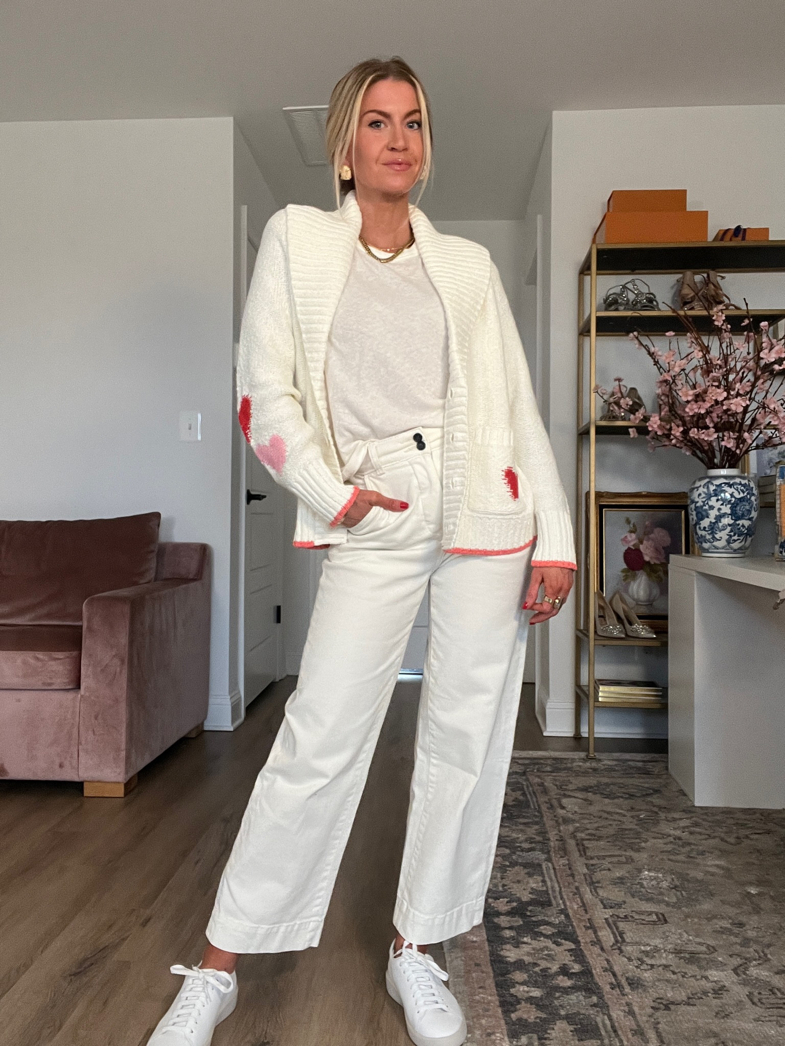 Valentine’s Day look, Anthropologie, heart cardigan, white wide leg pants 

#LTKstyletip #LTKSeasonal