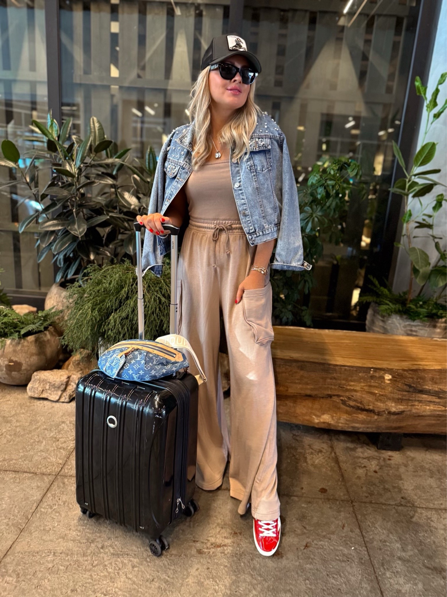 Travel look! They brought back this onesie jumpsuit that I absolutely adore. Cargo pockets, drawstring waist and strapless. Wearing a small! Stays put! 🤗

Jacket, small.
Shoes, TTS. 

 Travel outfit. Luggage. Onesie. Denim jacket. Romper. Jumpsuit. Lounge wear. Casual outfit. 


#LTKFindsUnder100 #LTKStyleTip #LTKTravel