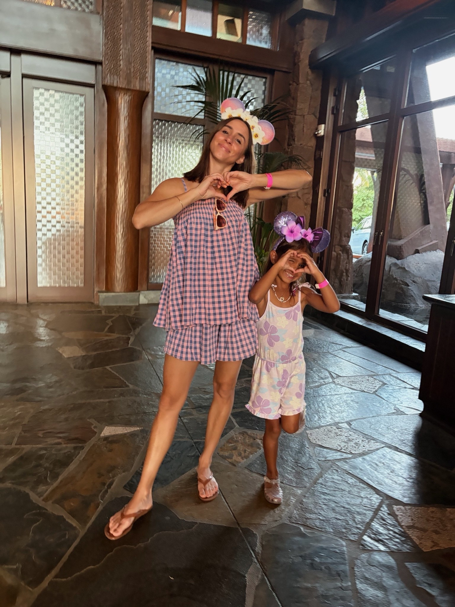 Hawaii Outfits Day I 🌺
Linking : bathing suits & dinner outfits for the whole fam (as much as I can)  my daughters romper (pictured here) is old navy & sold out. Linked the same romper in a different print and then some similar Amazon options! Mickey ears we bought at the resort, no link available! #hawaii #hawaiiootd #aulani #summer #familyvacation

#LTKKids #LTKTravel #LTKootd
