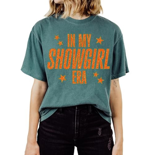 Life Of A Show girl Graphic T-Shirt, Retro Orange Glitter Text with Stars | Vintage Style Unisex Comfort Tee | Concert Outfit Shirt | Trendy October Event Fashion (Emerald, Medium) | Amazon (US)