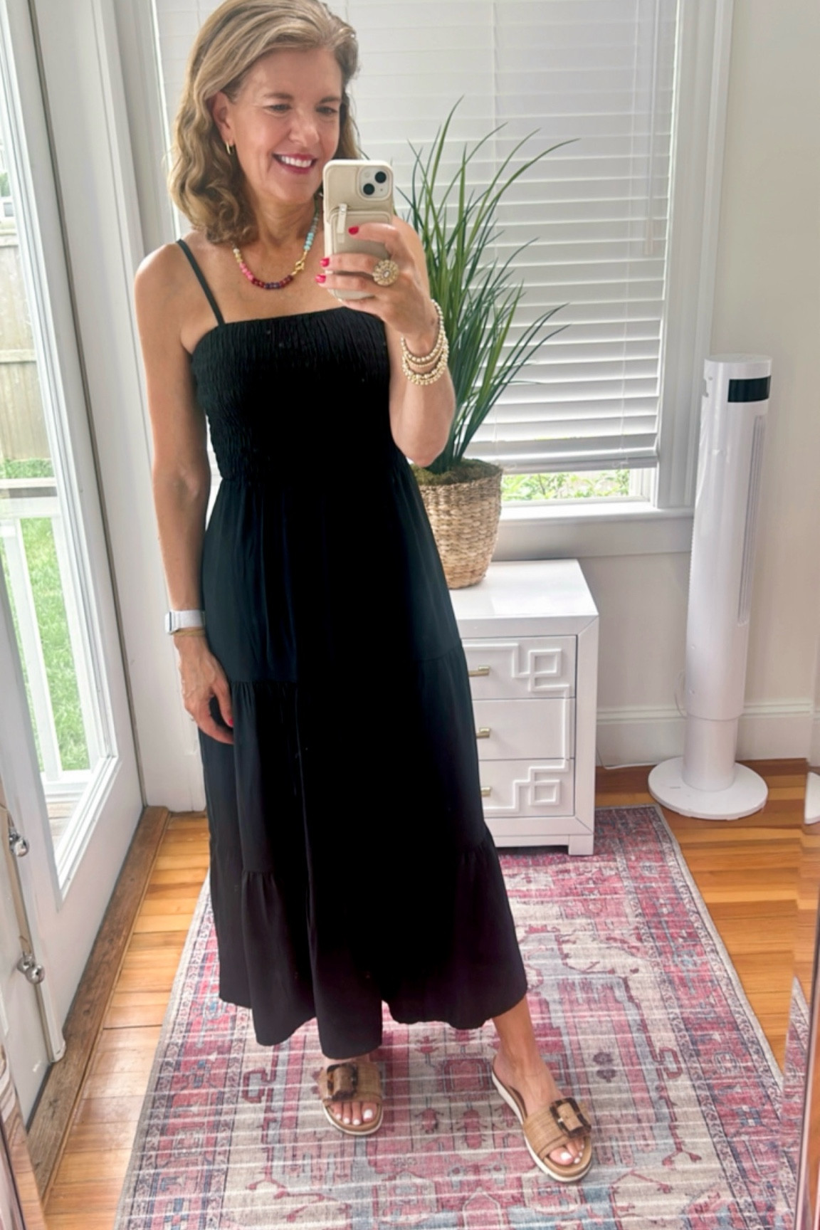 Want to look and feel cool 😎 on a hot summer day or night? A black (or navy) sundress is easy, forgiving, and chic. Pair with caramel or rattan accessories. #Justgetdressed 

#LTKSummerSales #LTKStyleTip #LTKOver40