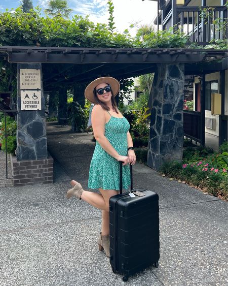 End of summer but start of fall travel outfit idea: smocked green floral romper from Amazon, tan boater hat, black sunglasses,, and nude ankle boots  

#LTKunder50 #LTKtravel #LTKstyletip