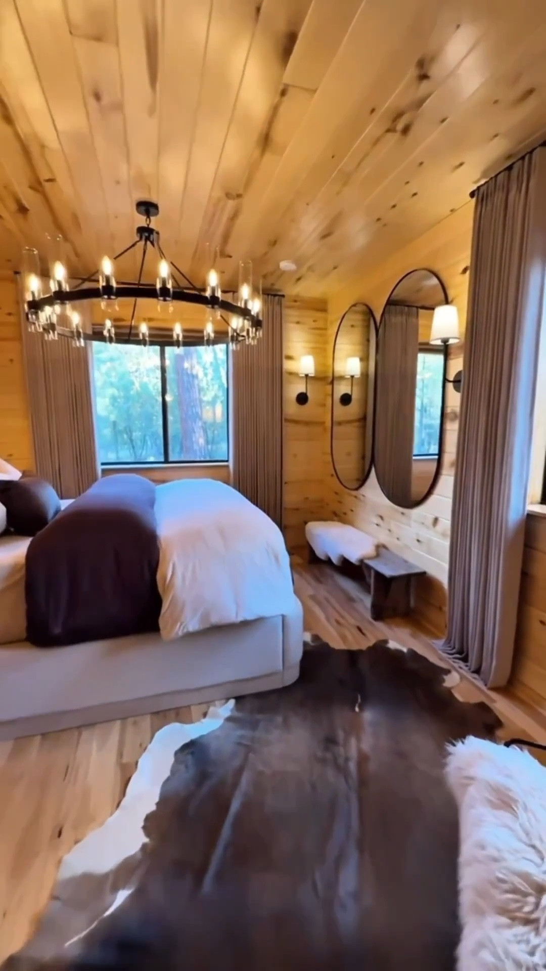 Our cozy little mountain cabin got a glow-up 🌟
The guest room transformation is giving boutique stay vibes. 🤎 Layered linen curtains, a bold chandelier, and mirrors that double the light (and the charm)! 🥰

One of the things that made me fall in love with this home is the beautiful tongue and groove woodwork throughout. It gives the whole space so much warmth and character. 🪵 

#cabindecor #mountainhome #cabingetaway #cabinlife #cabinmakeover #cozycabin #cabinbedroomdecor #bedroom #bedroomdecor #livingspace #homedecoraesthetics #interiordecor #amazonfurniture #earthyhomedecorideas 


#LTKFindsUnder100 #LTKselfcare #LTKHome