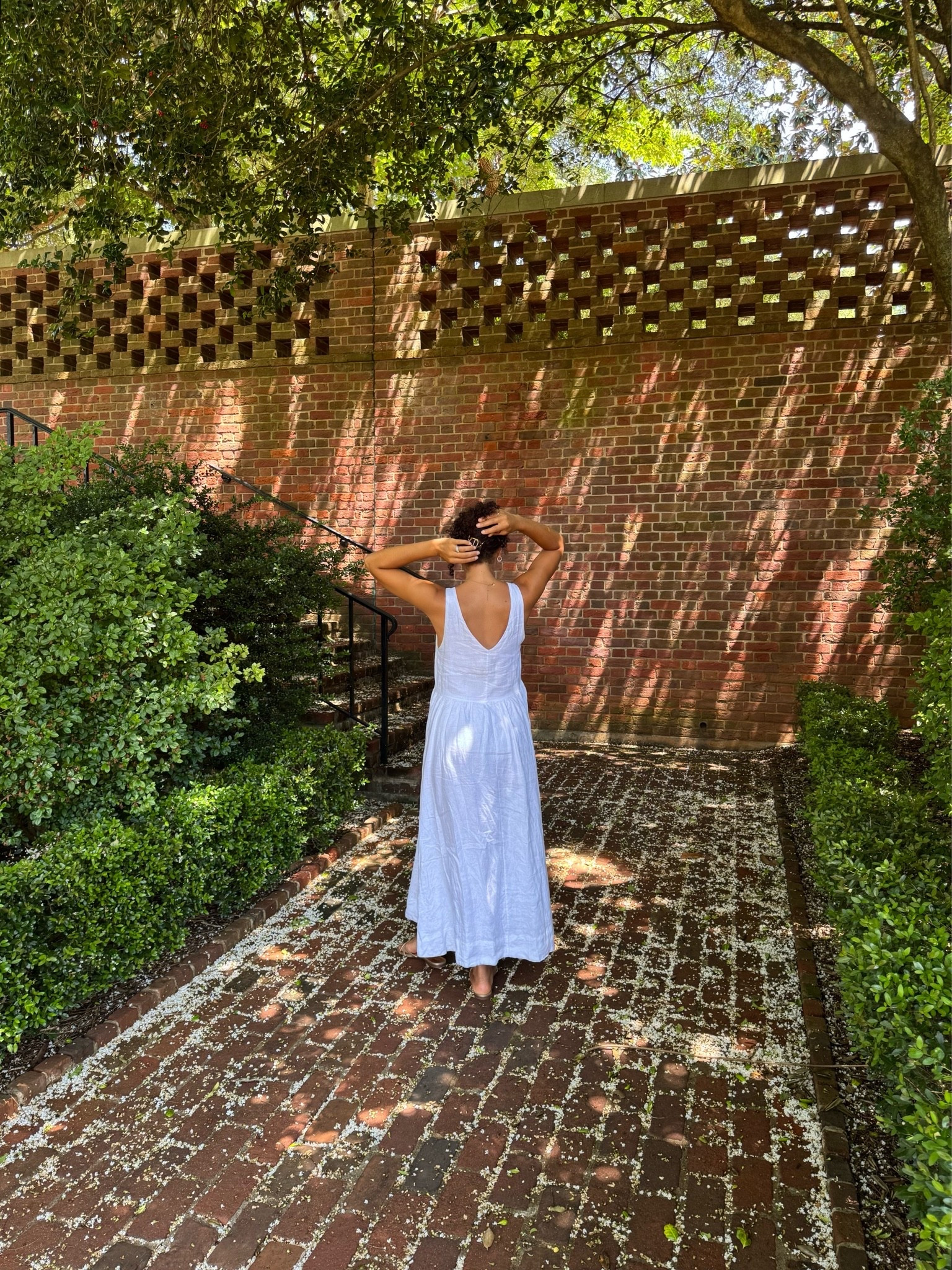 A white v neck midi linen dress is a great way to beat the heat! (Linking similar) looks great with a gold hair clip to keep the hair off your neck and matching gold sandals

#LTKootd