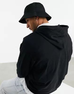 ASOS DESIGN wide brim bucket hat in black cotton | ASOS (Global)