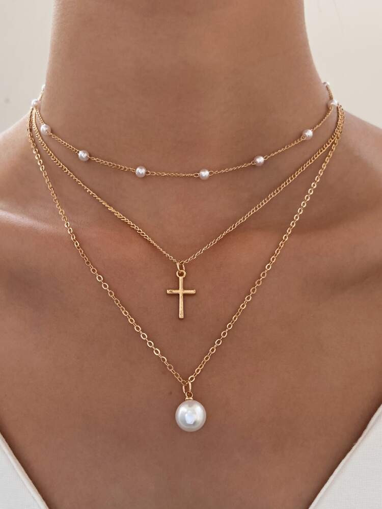 $1.90        
    (47)
        
      3pcs/set Faux Pearl & Cross Pendant Necklace
       
      ... | SHEIN
