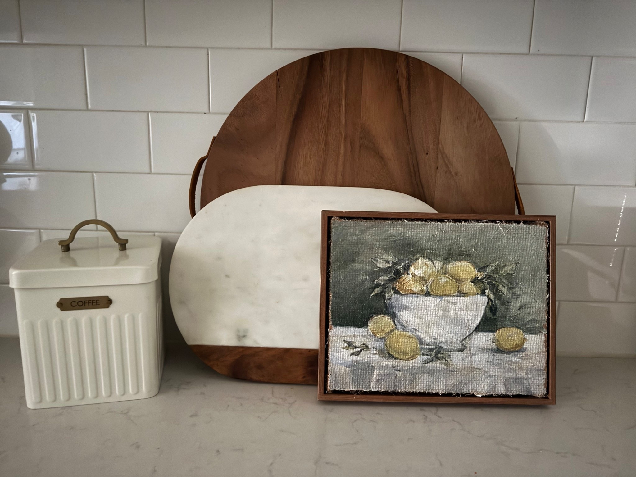 Easy layering pieces ca spruce up your kitchen counter plus these cutting boards are functional  

#LTKHome #LTKFindsUnder50 #LTKFindsUnder100