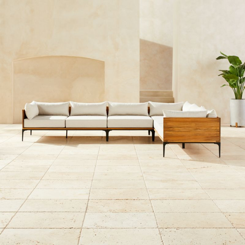 Naya 4-Piece Cast Iron and Teak Sectional Sofa with Ivory Sunbrella Cushions | CB2 | CB2